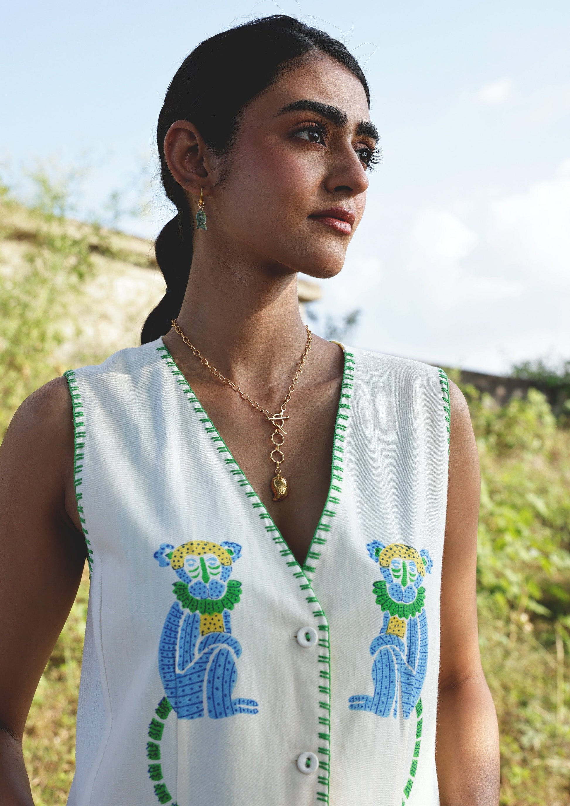 Vrinda vest top with monkey block print from The Raw India, featuring a stylish sleeveless design and vibrant fabric details.