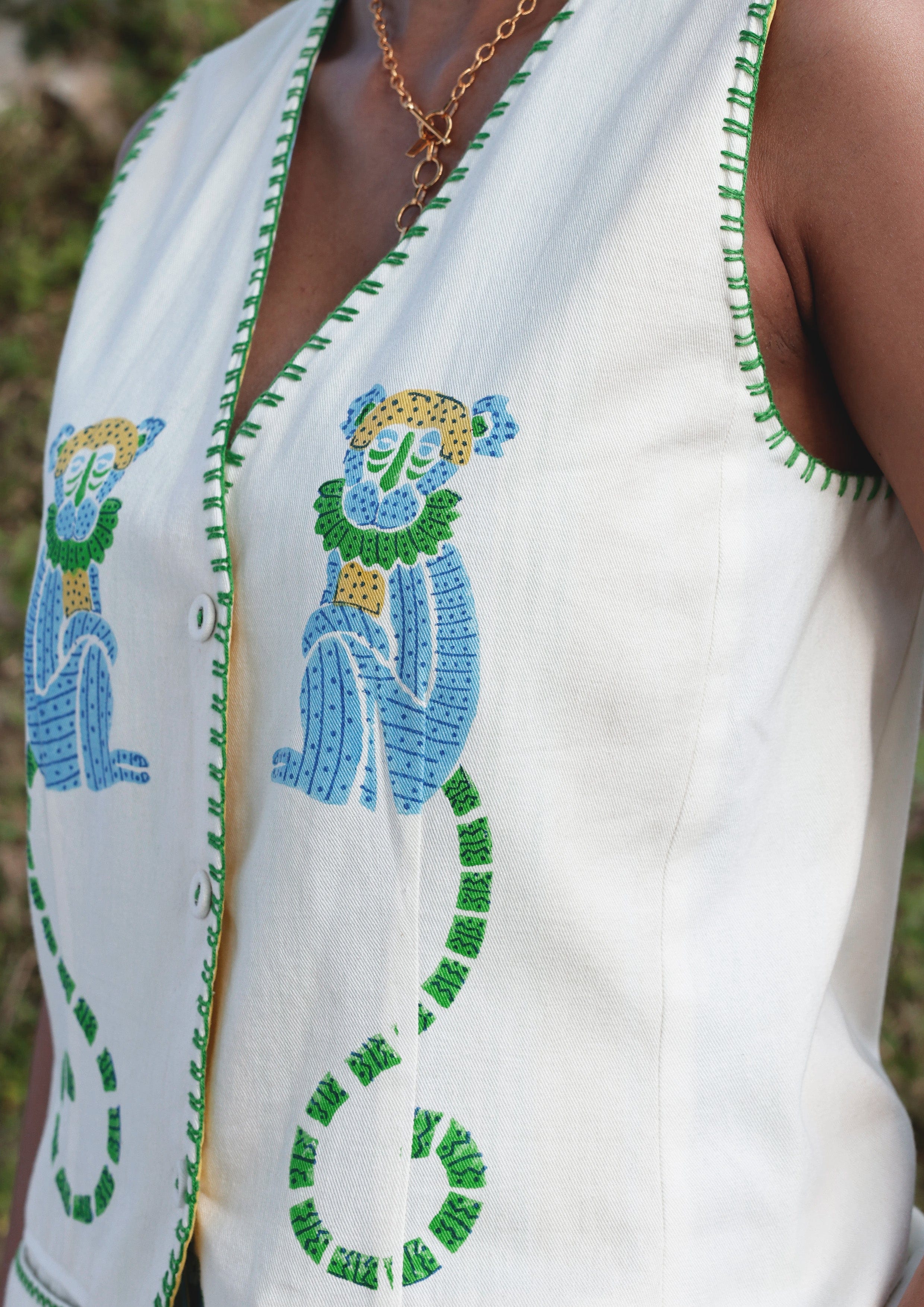 Vrinda vest top with monkey block print from The Raw India, featuring vibrant fabric and traditional design details.