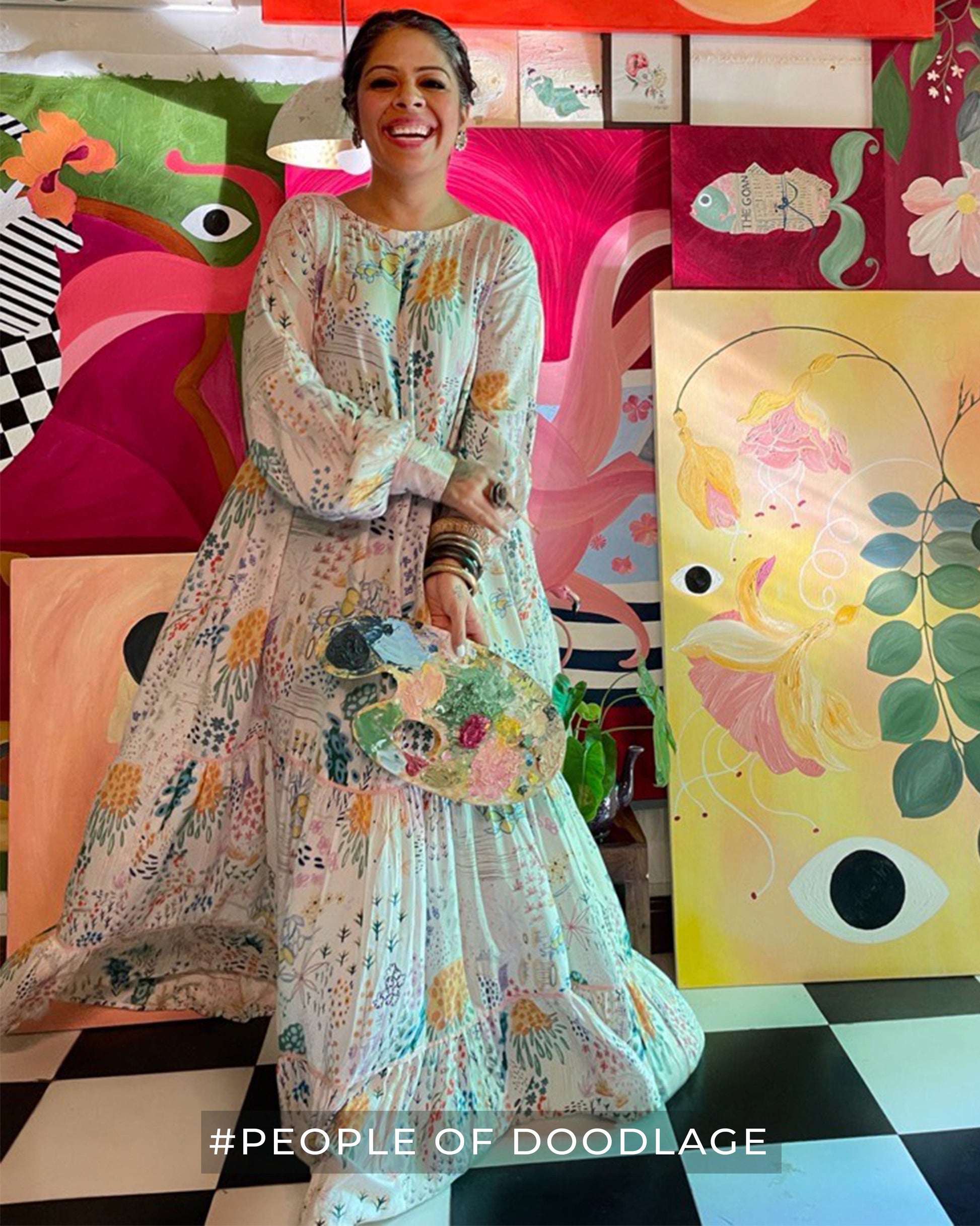 Doodlage Yayoi printed dress with colorful floral pattern, lightweight fabric, and knee-length design worn by a model.