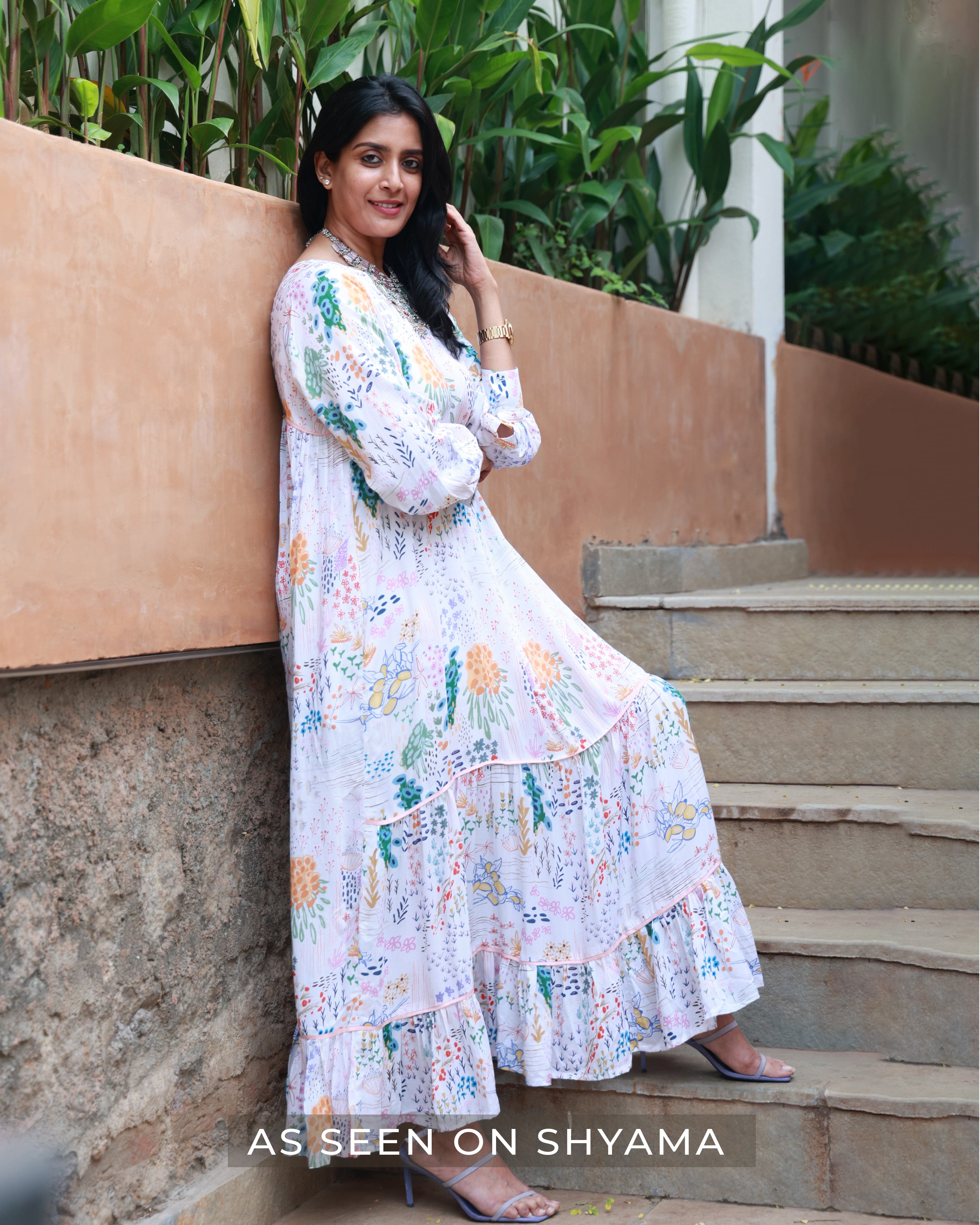 Doodlage Yayoi printed dress featuring vibrant, artistic floral patterns and a flowing silhouette on lightweight fabric.
