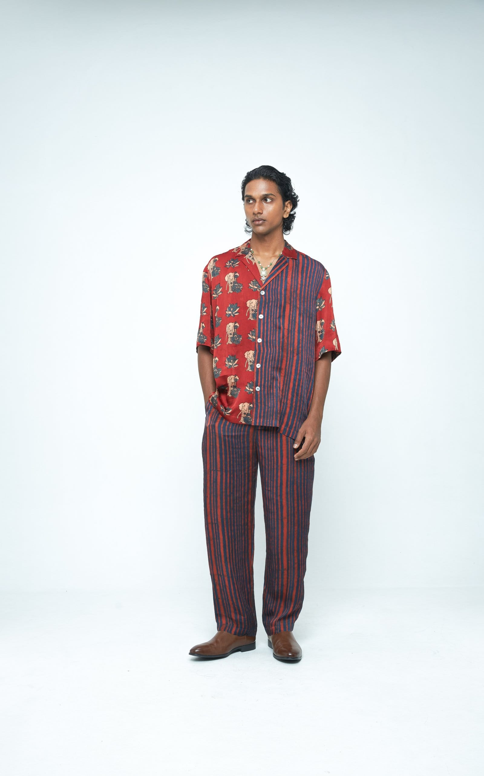 Front view of Anushe Pirani giant lotus shirt, featuring a vibrant lotus design on a stylish shirt.