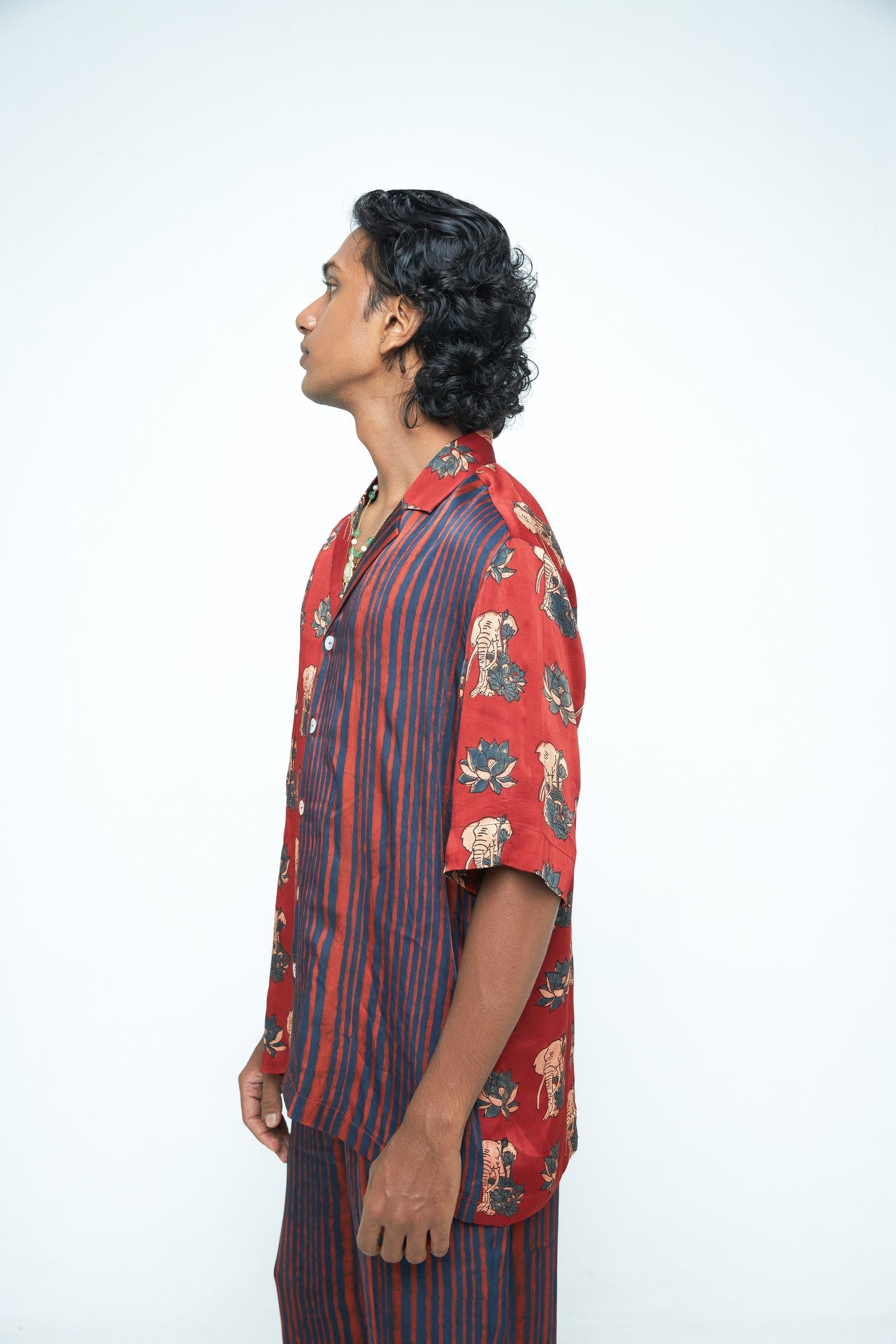 Side view of a Giant Lotus shirt by Anushe Pirani, showcasing the detailed floral design on the fabric.