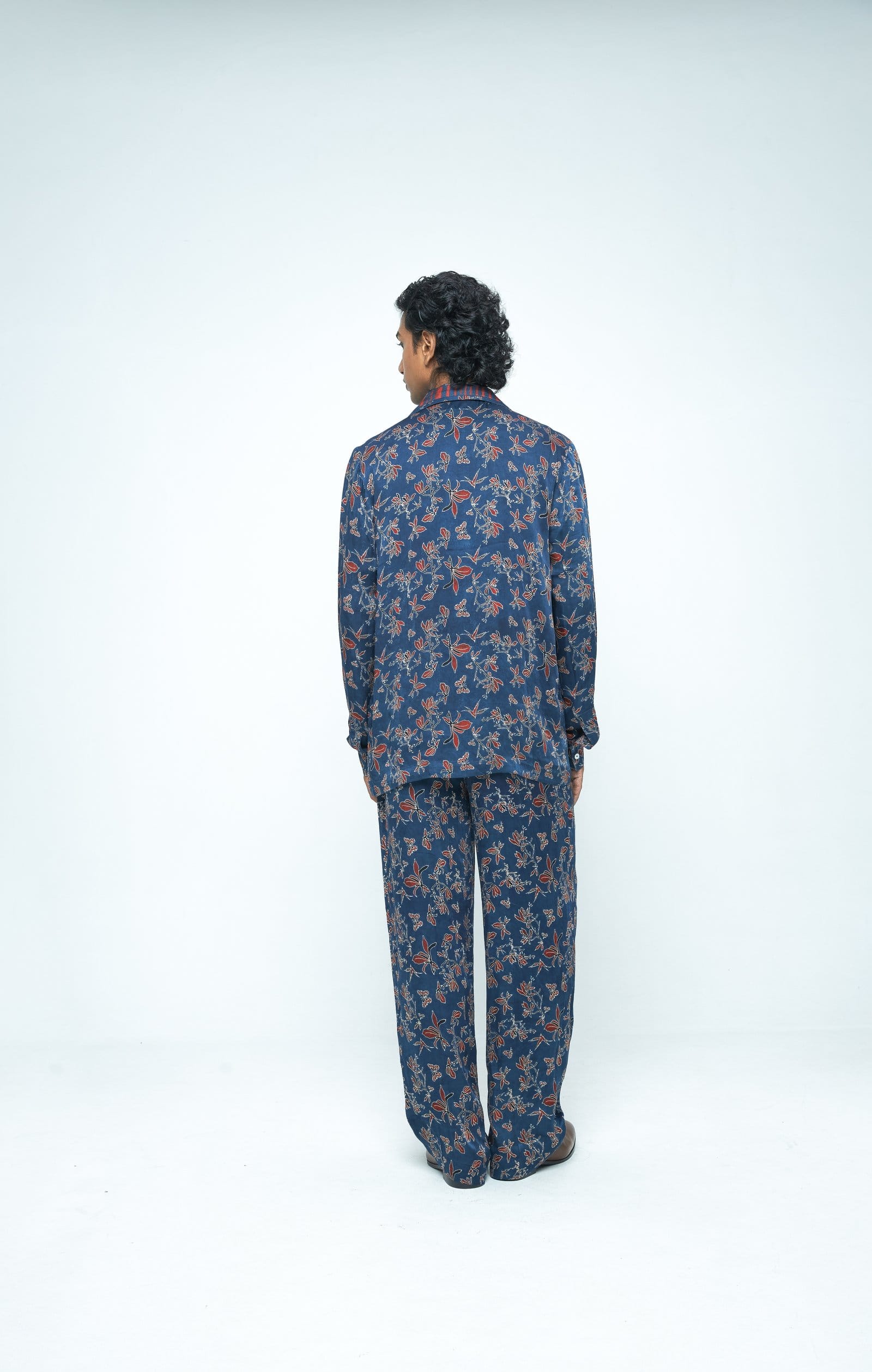 Back view of Anushe Pirani Eden shirt showing its stylish design and fabric details.
