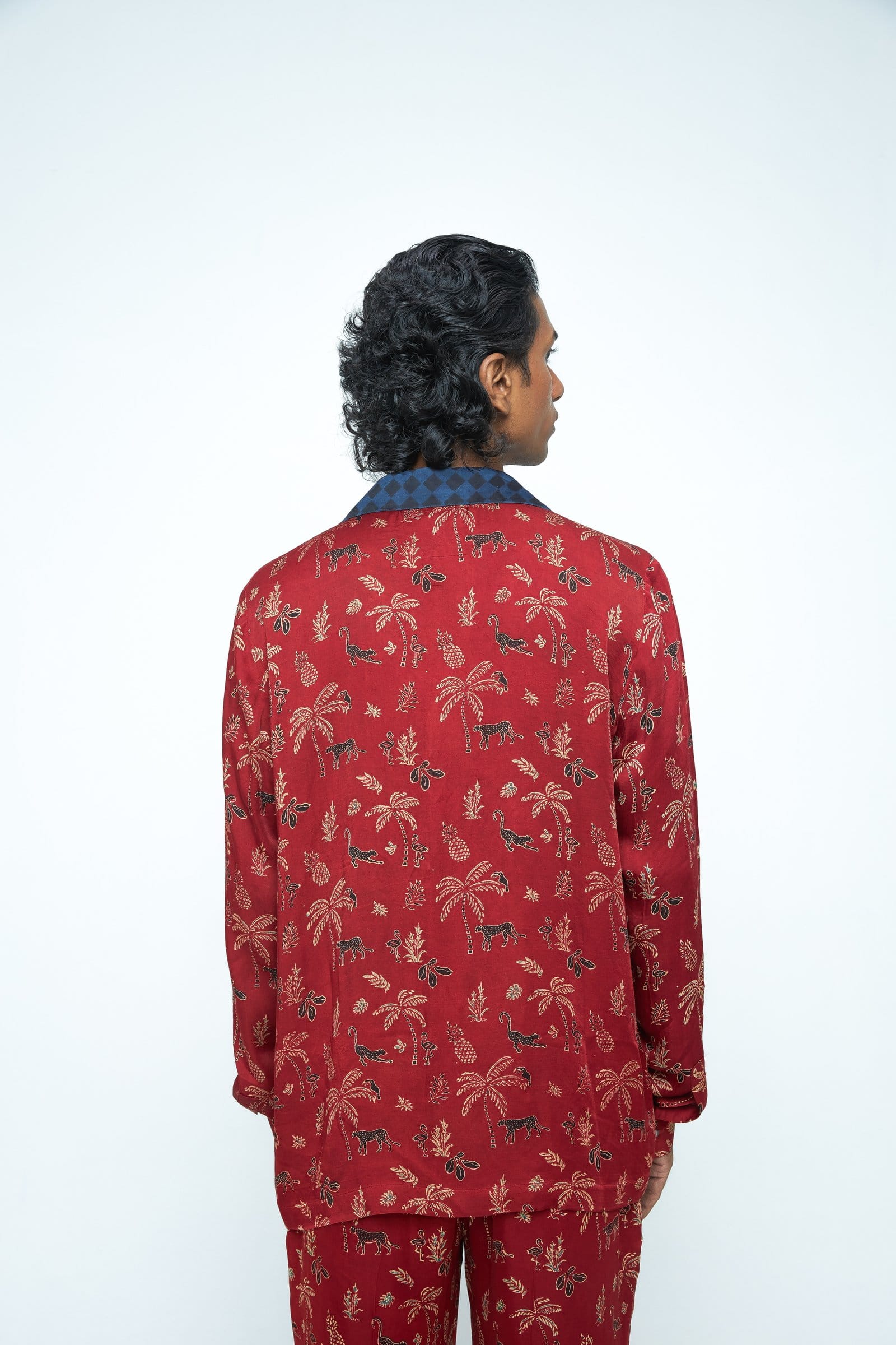 Back view of Anushe Pirani Wild T-Shirt showing the printed design on a casual shirt.