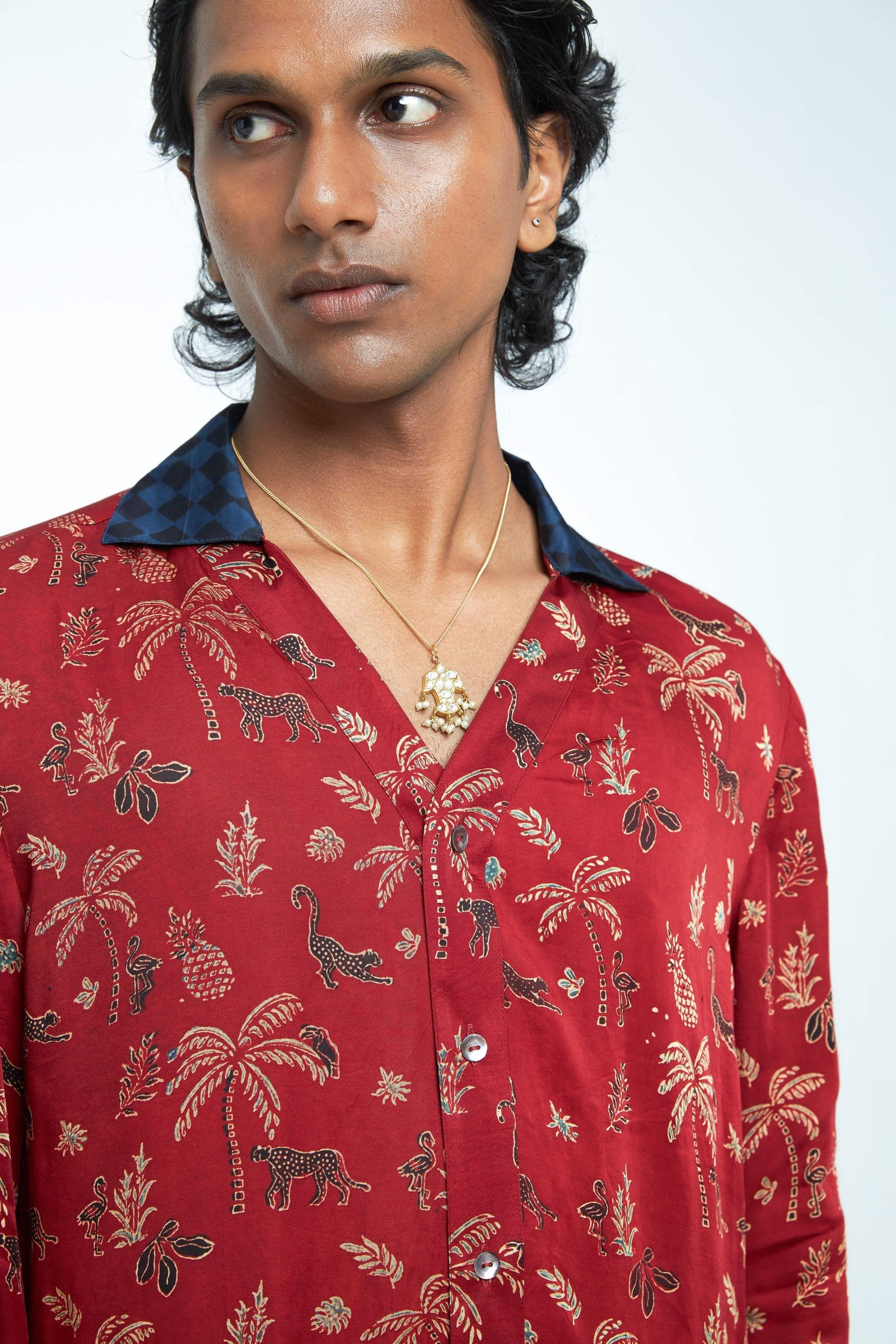 Close-up of Anushe Pirani Wild T-shirt showing detailed fabric and design, highlighting the stylish shirt's texture and branding.