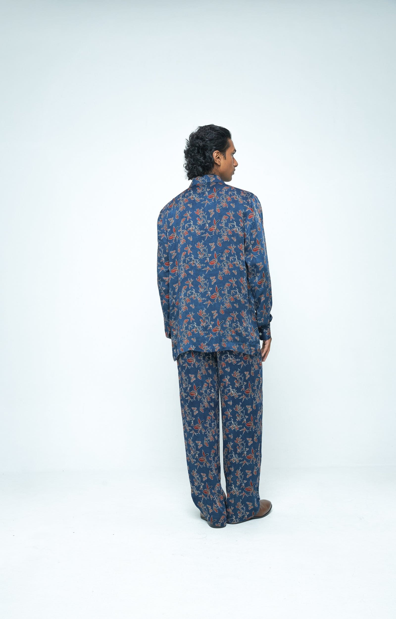 Back view of Anushe Pirani Flutter & Flow shirt, stylish long-sleeve shirt with a modern, flowing design in soft fabric.
