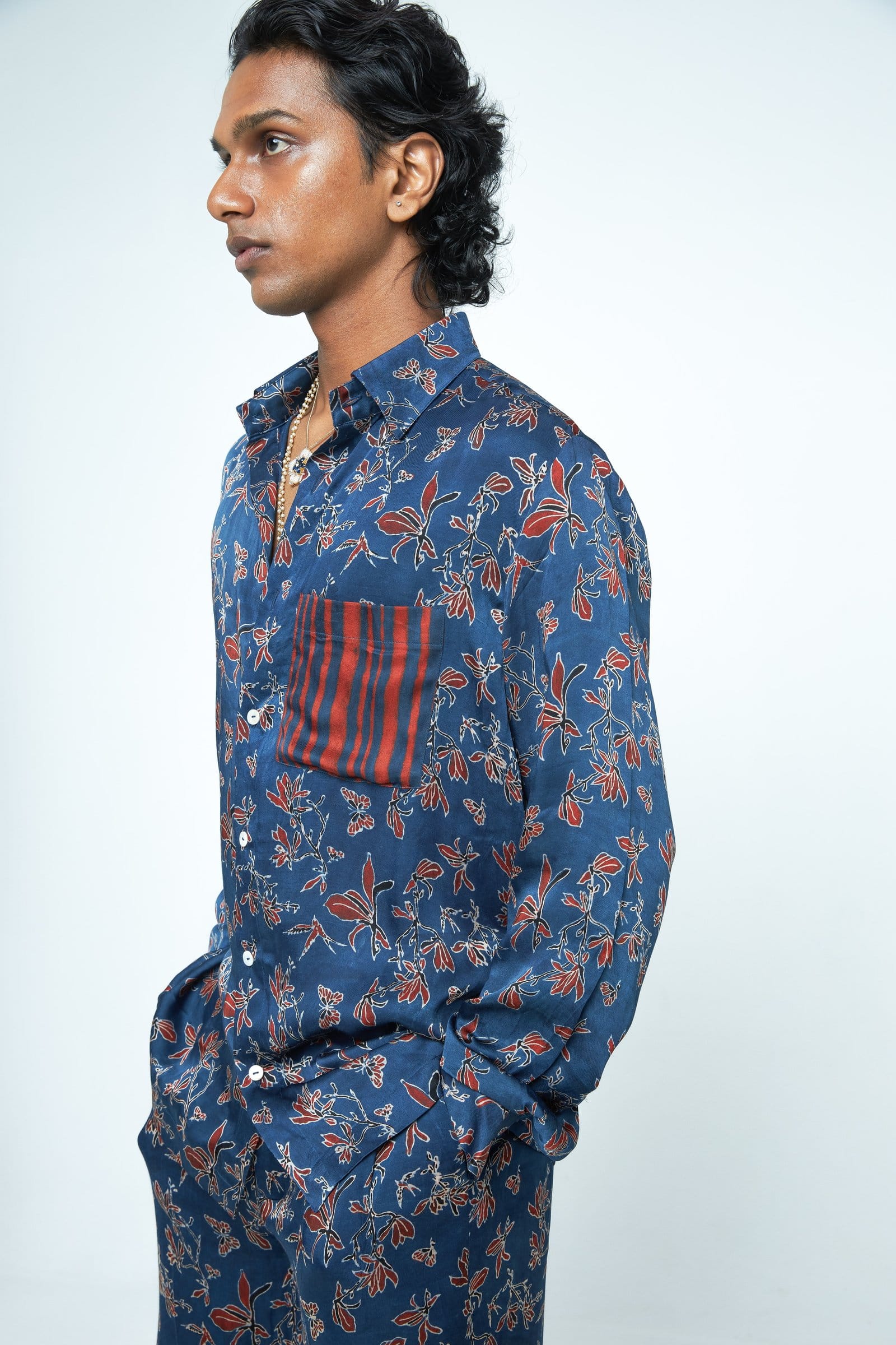 Close-up of Anushe Pirani Flutter & Flow shirt showing detailed fabric texture and tailored collar design.