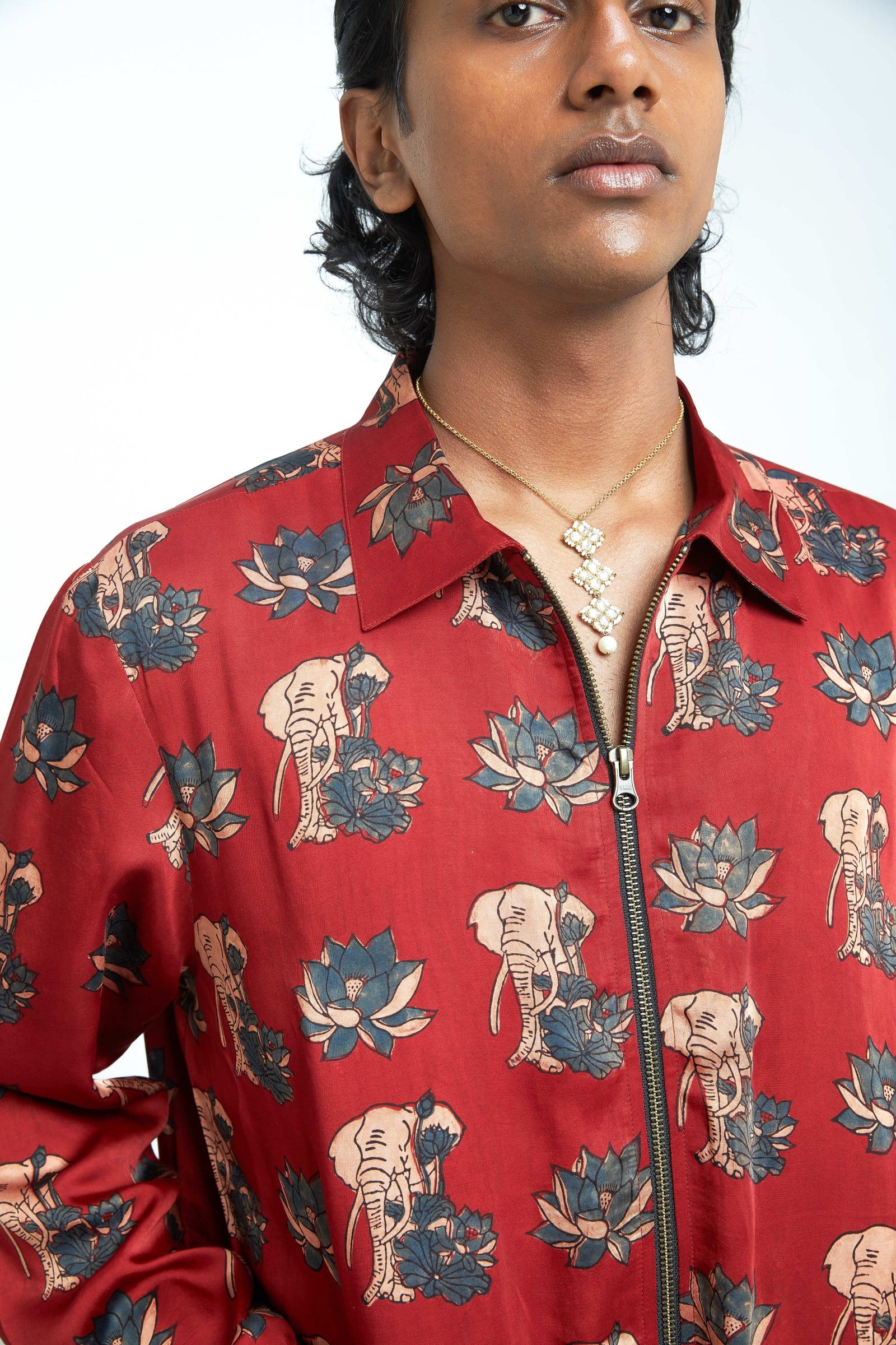 Rustic bomber jacket by Anushe Pirani featuring textured fabric and stylish design, shown in a detailed close-up image.