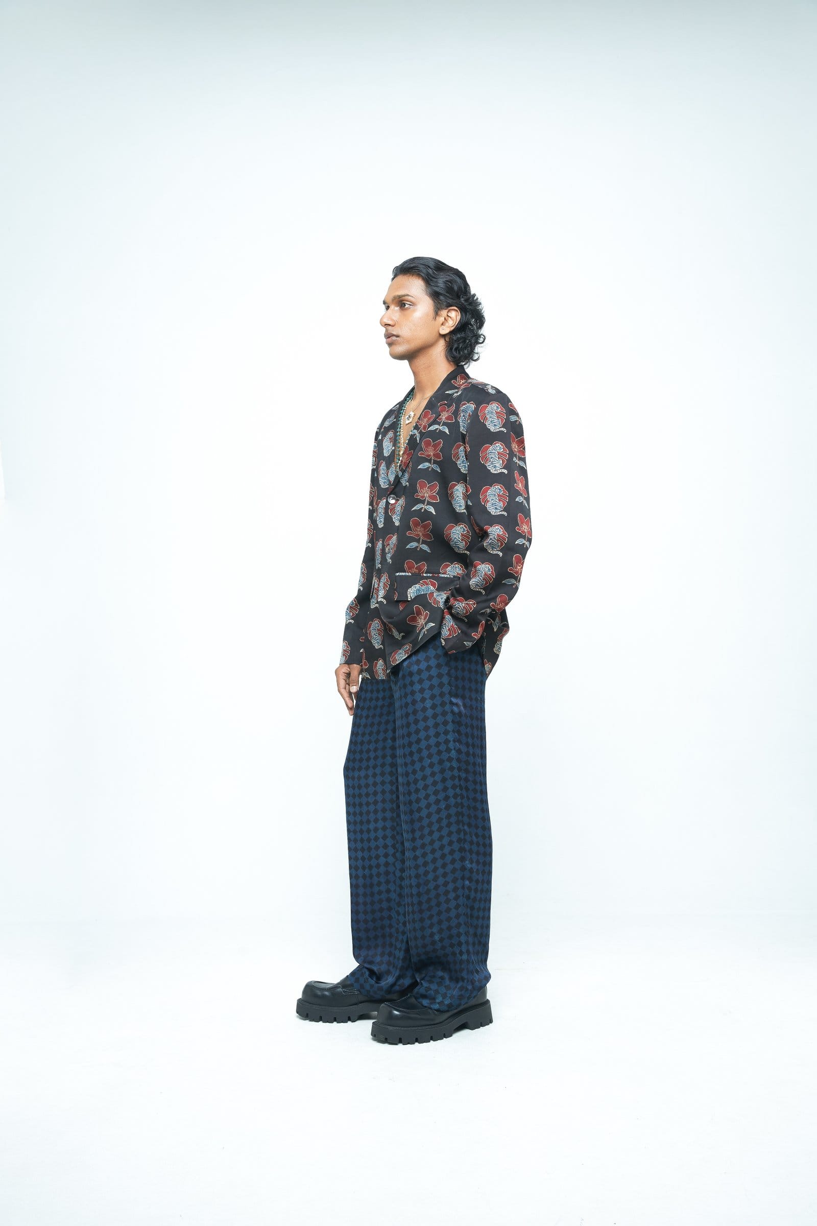 Side view of Anushe Pirani Bold blazer, stylish tailored blazer in a classic design, perfect for formal or casual wear.
