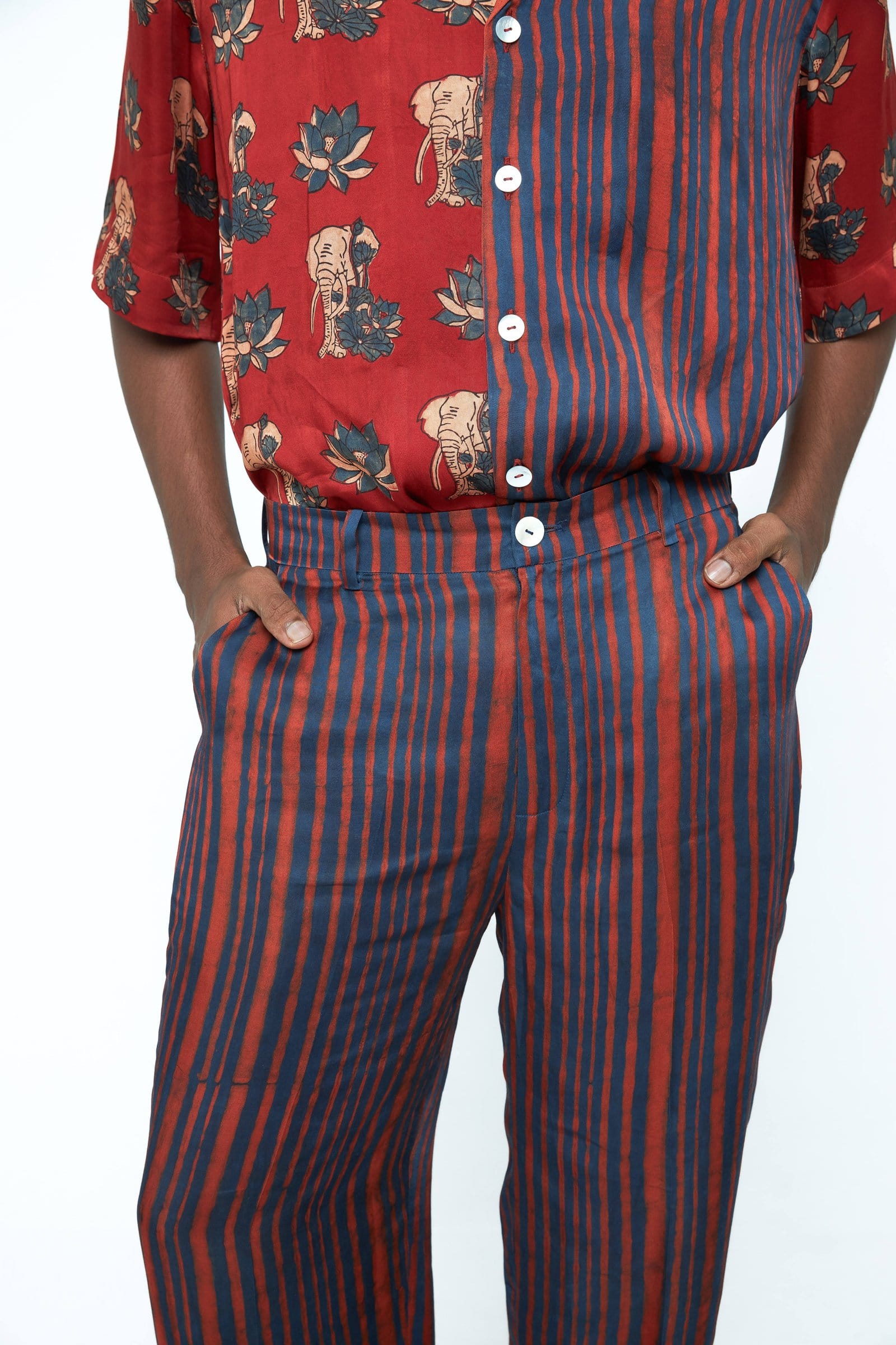 Rustic tapered pants by Anushe Pirani with a relaxed fit, showcasing earthy fabric and tapered design details.