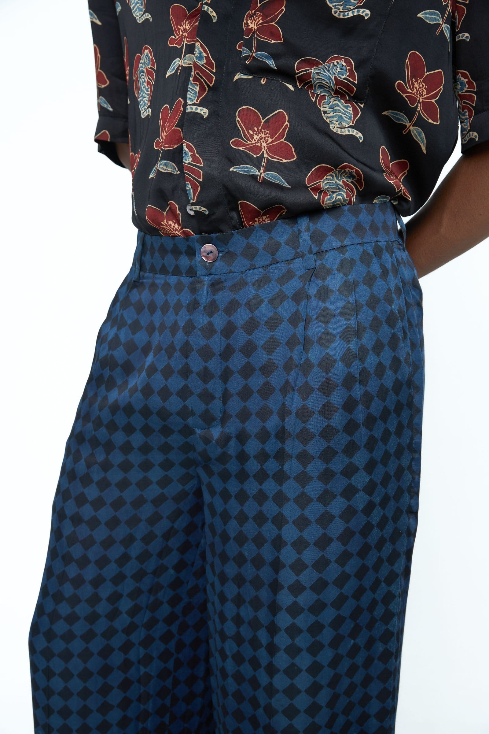 Anushe Pirani shadow pleat pants featuring stylish pleats and a tailored fit, shown in a detailed view.
