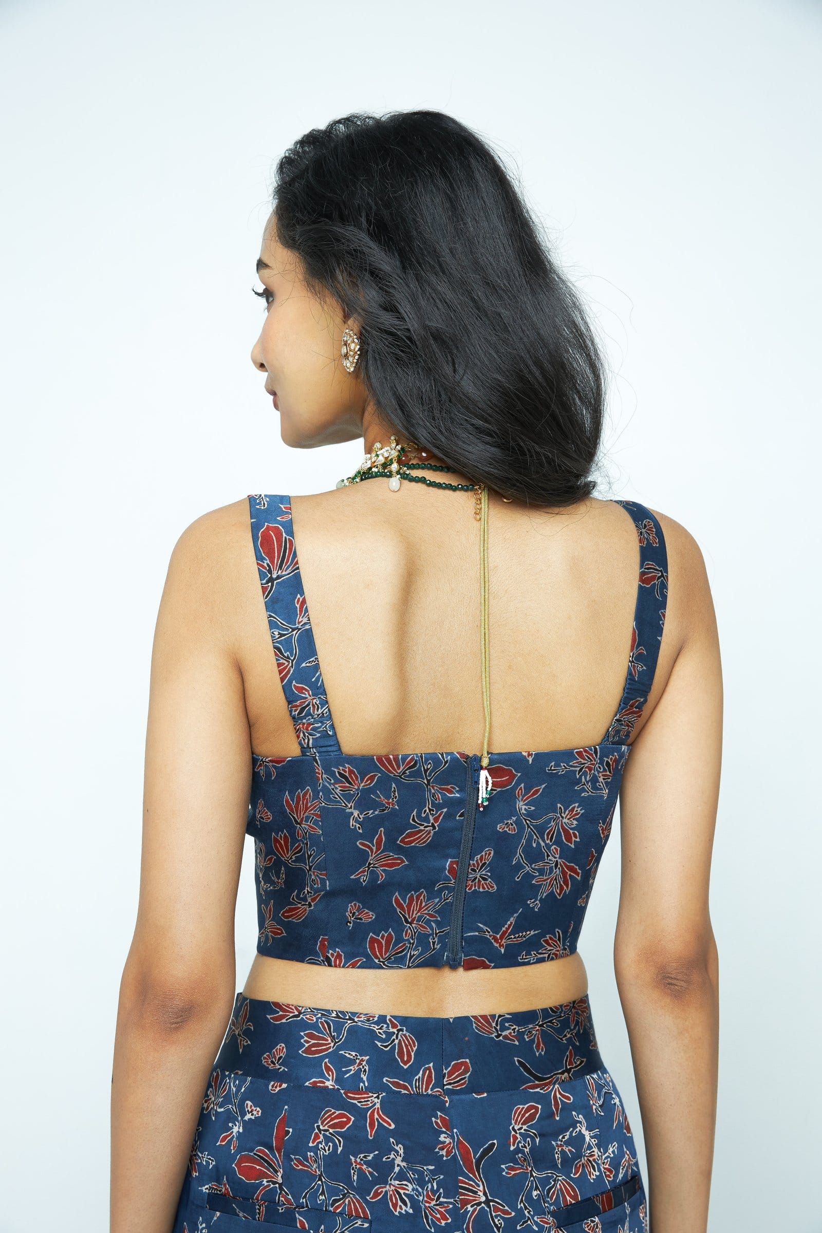 Back view of Anushe Pirani Bloom corset top, featuring structured design and intricate detailing on the fabric.