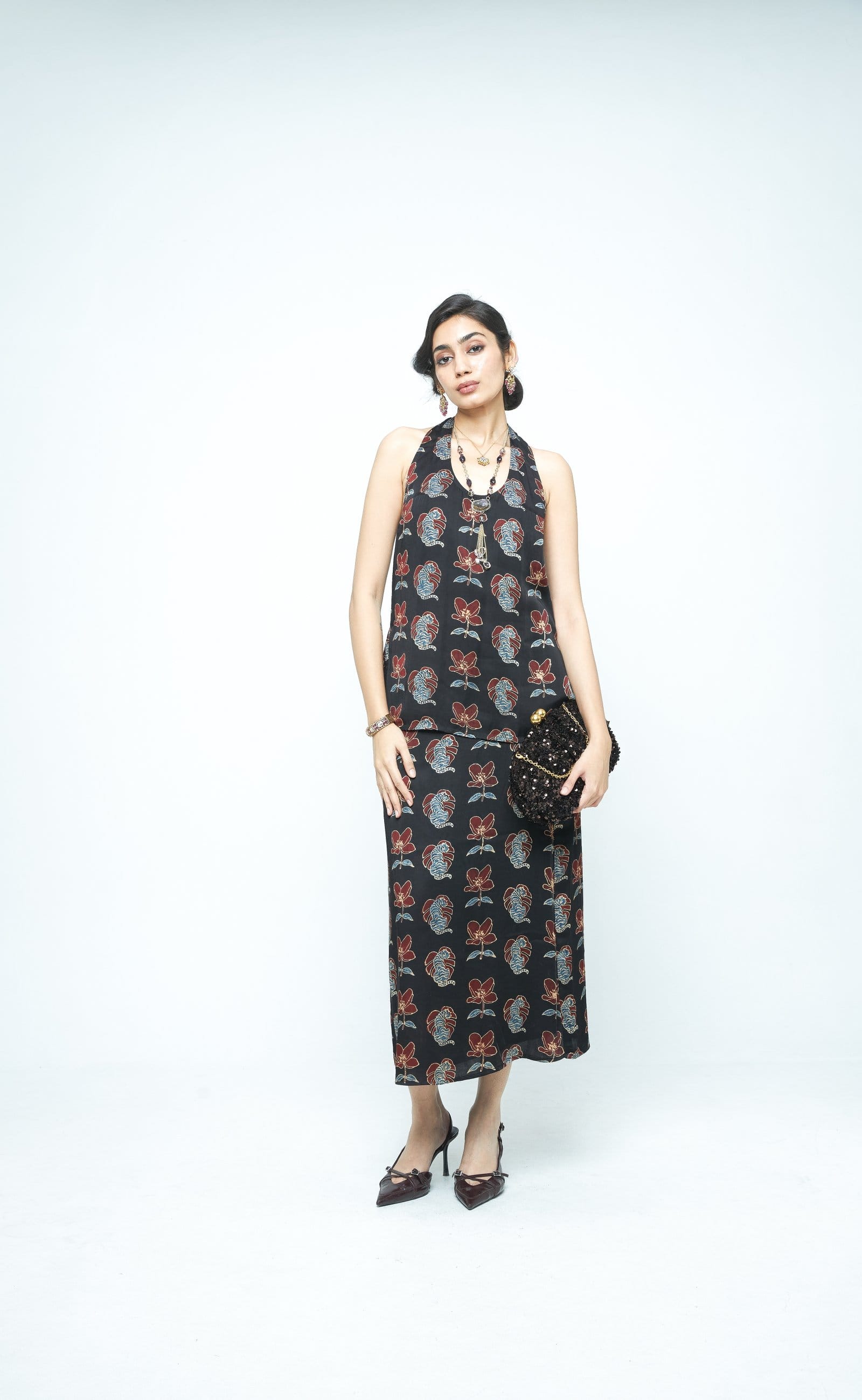 Front view of the Anushe Pirani Bold halter top, featuring a stylish design with a fitted neckline and bold detailing.