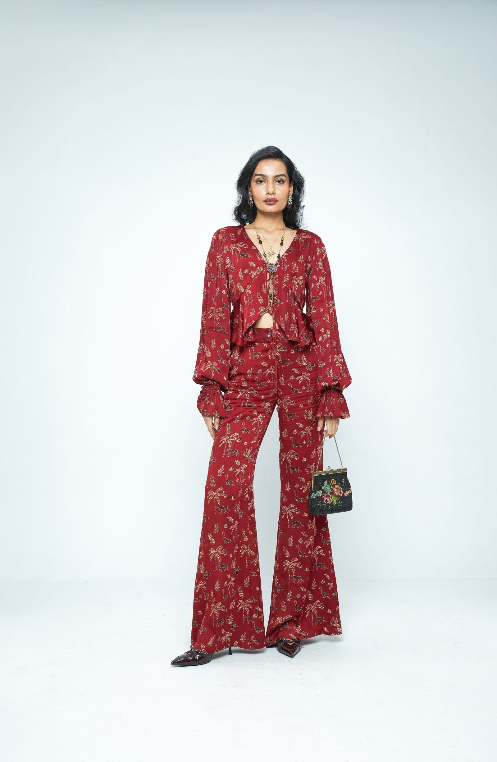 Anushe Pirani Cascade top featuring a stylish design, front view showcasing the elegant cut and fabric texture.