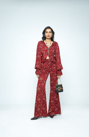 Anushe Pirani Cascade top featuring a stylish design, front view showcasing the elegant cut and fabric texture.