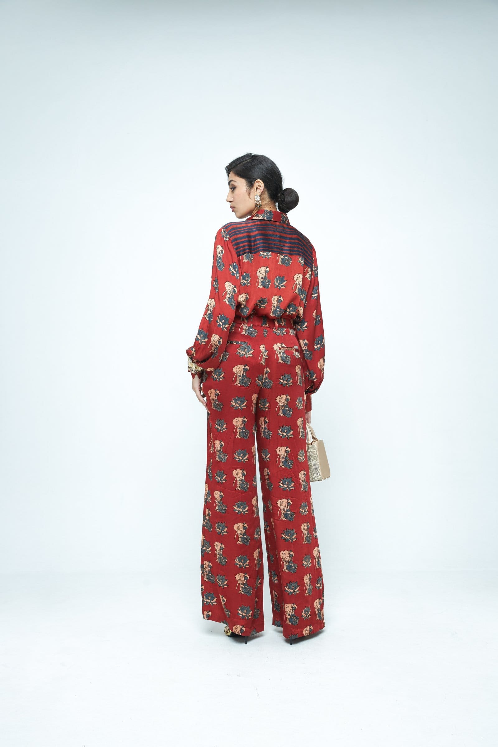 Back view of Anushe Pirani Lotus shirt, a stylish button-up shirt with a floral lotus design and relaxed fit.