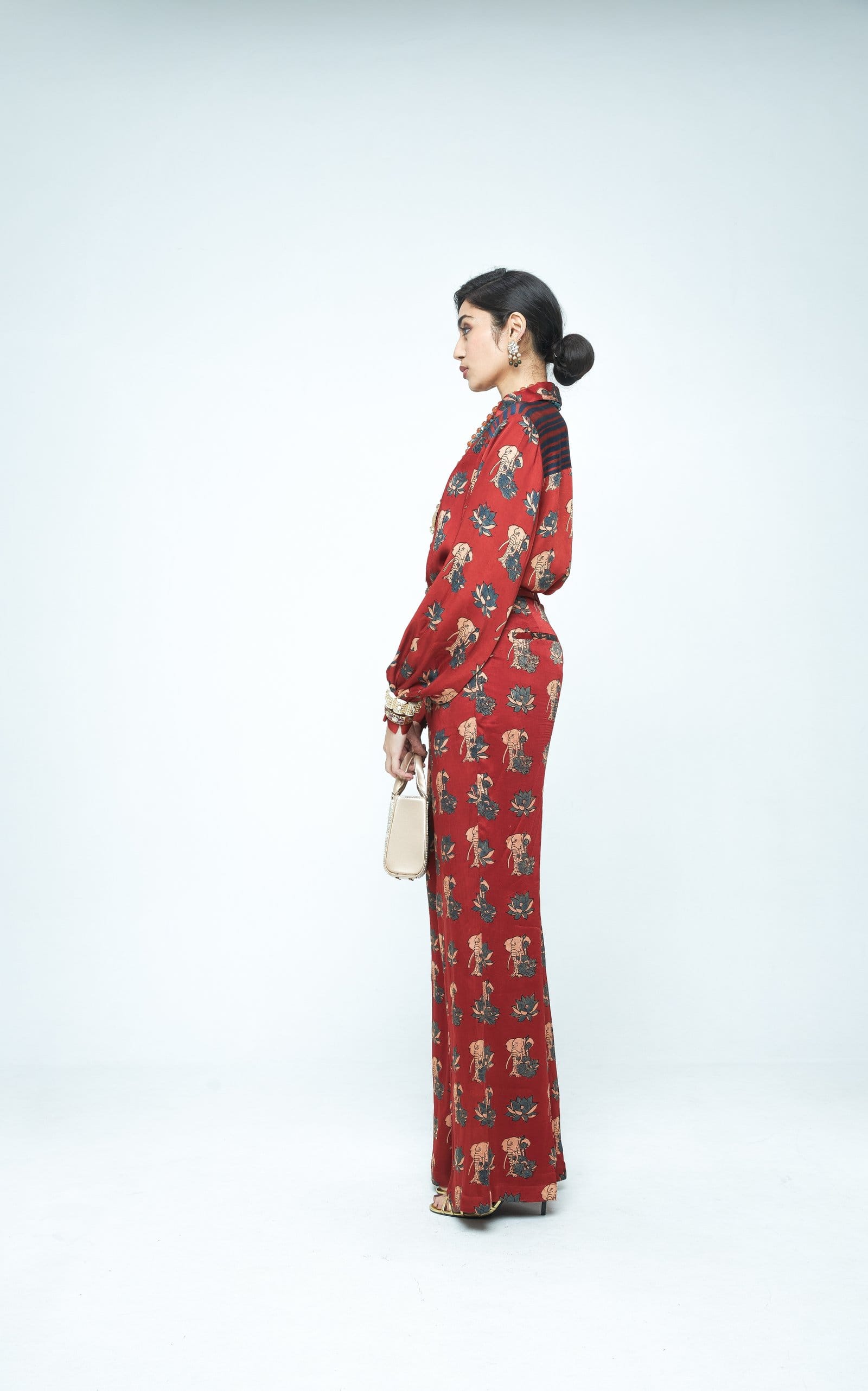 Side view of Anushe Pirani Lotus shirt, a stylish women's blouse with intricate floral patterns and a relaxed fit.
