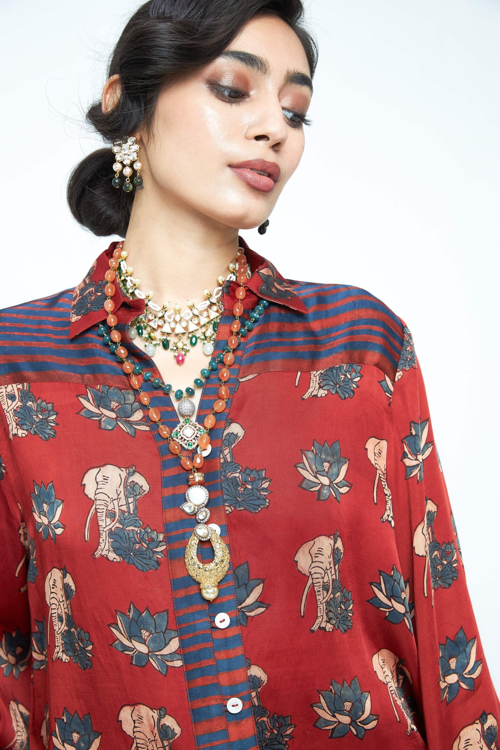 Close-up of an Anushe Pirani Lotus shirt showing intricate fabric detail and elegant design on a stylish shirt.