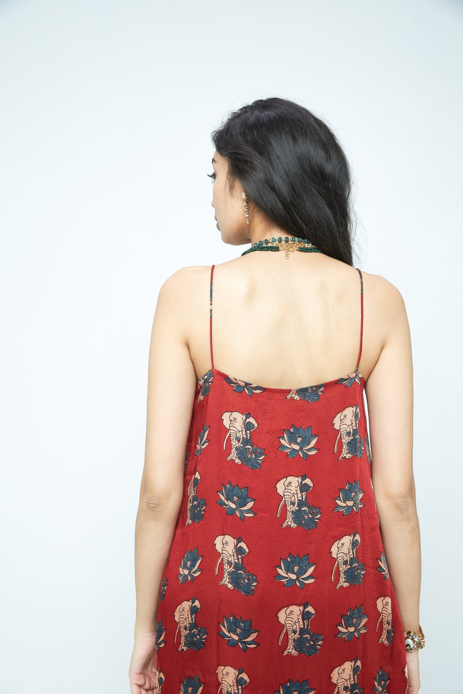 Back view of Anushe Pirani gentle tunic with long sleeves and relaxed fit, showcasing soft fabric and subtle design details.