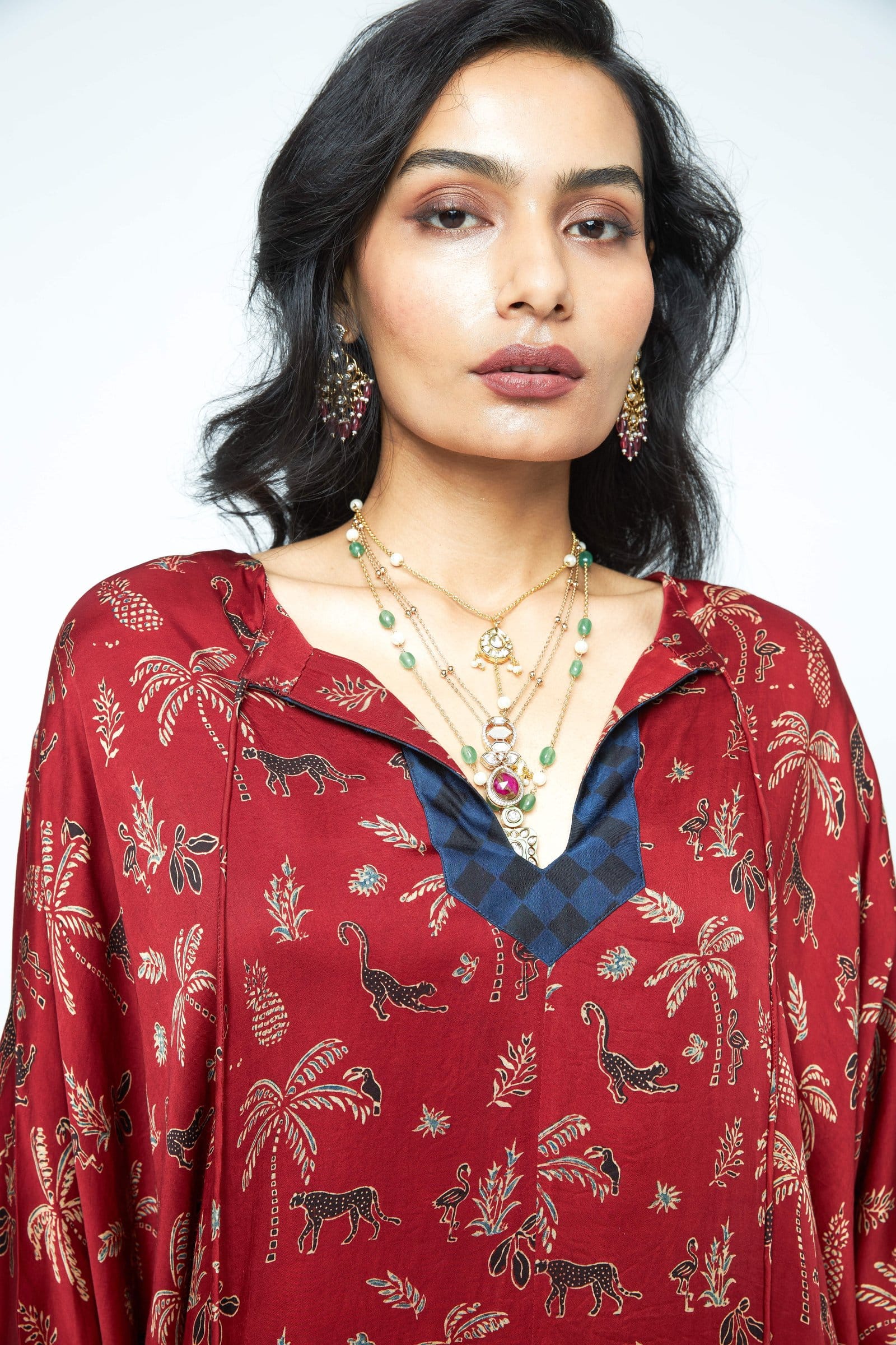 Anushe Pirani dolman sleeve tunic featuring a relaxed fit, soft fabric, and detailed stitching, perfect for casual wear.