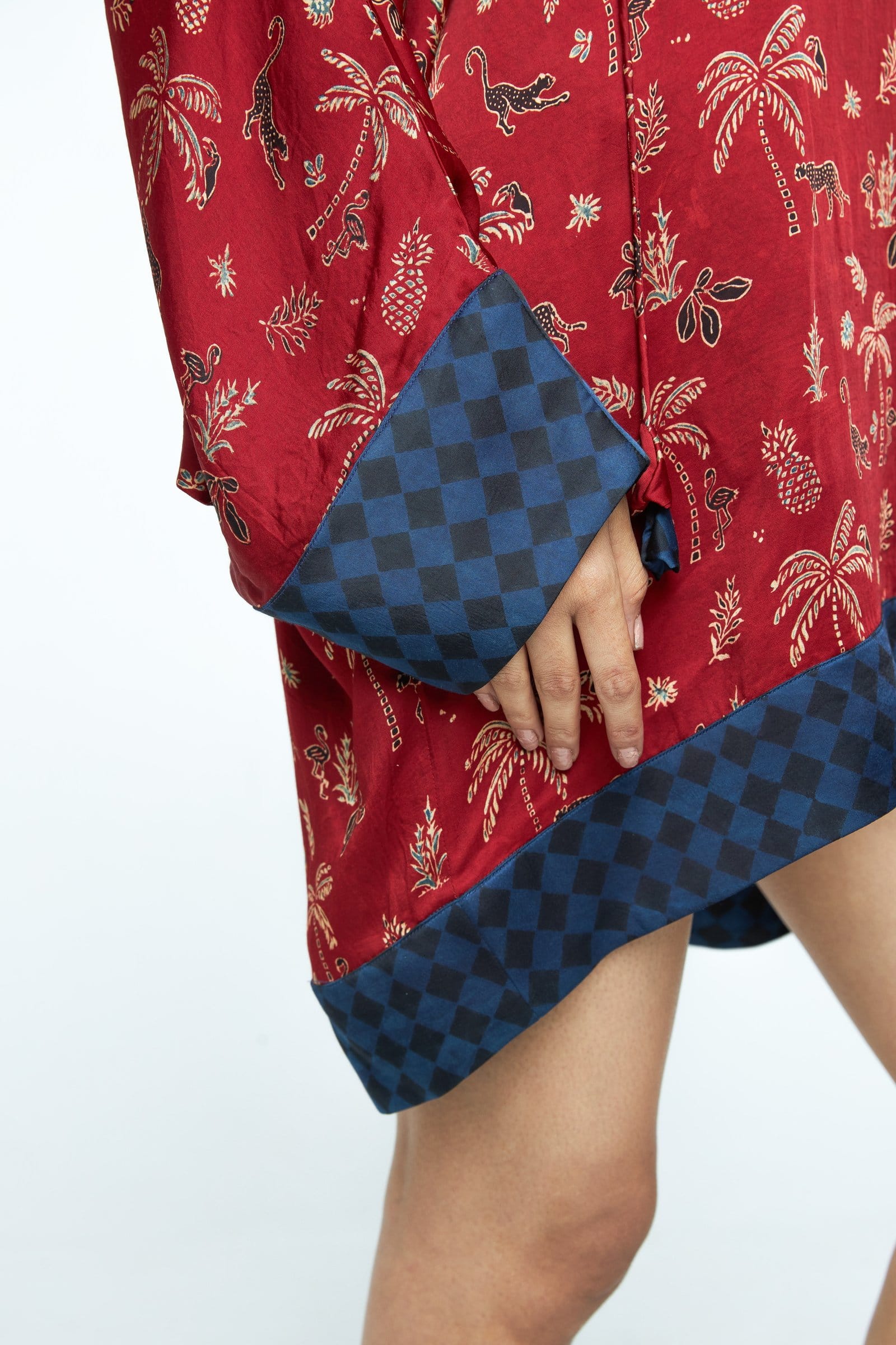 Close-up of Anushe Pirani Dolman sleeve tunic showing detailed fabric texture and stylish sleeve design.