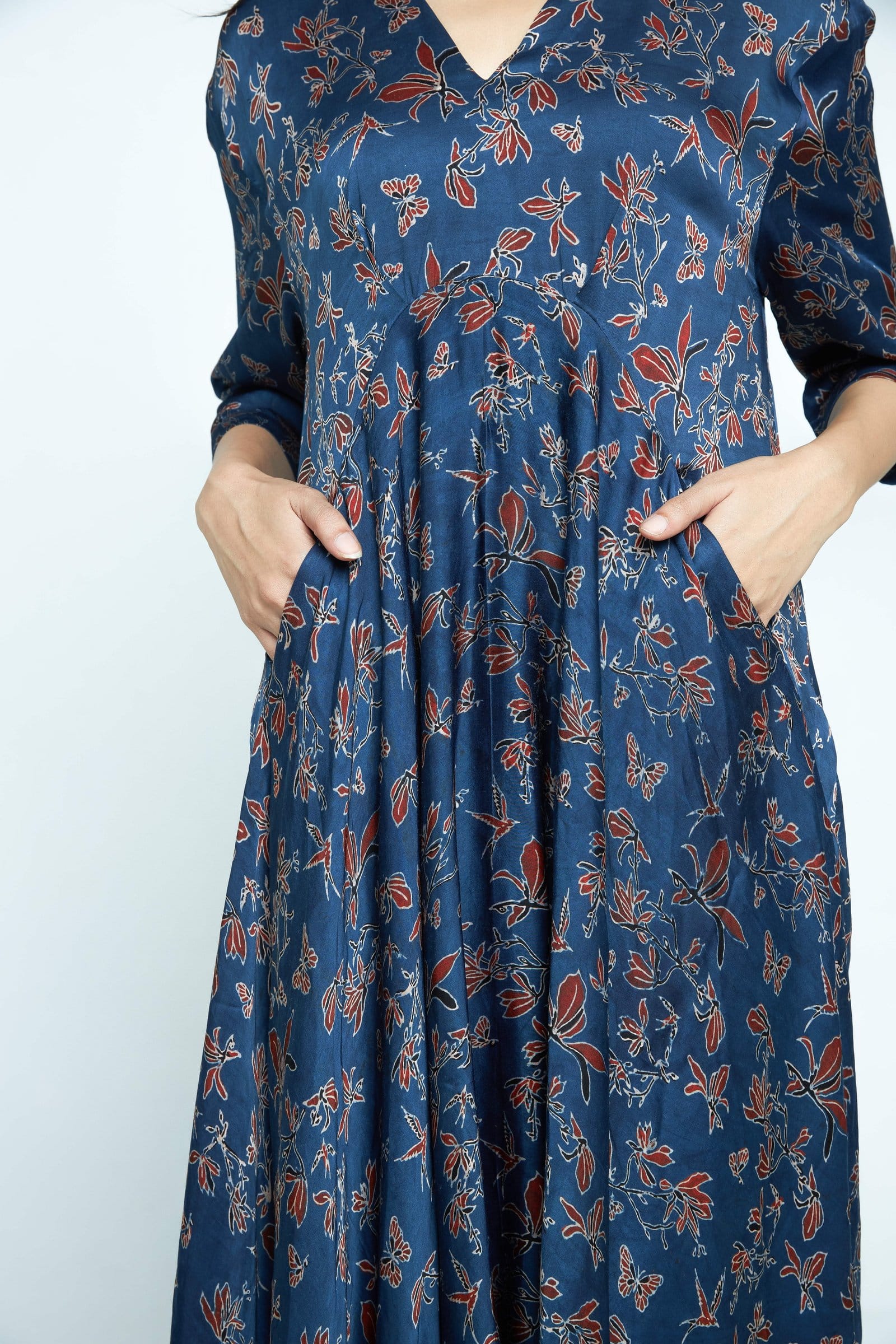 Elegant Cascade dress by Anushe Pirani featuring flowing fabric and intricate detailing, showcased in this stylish product image.