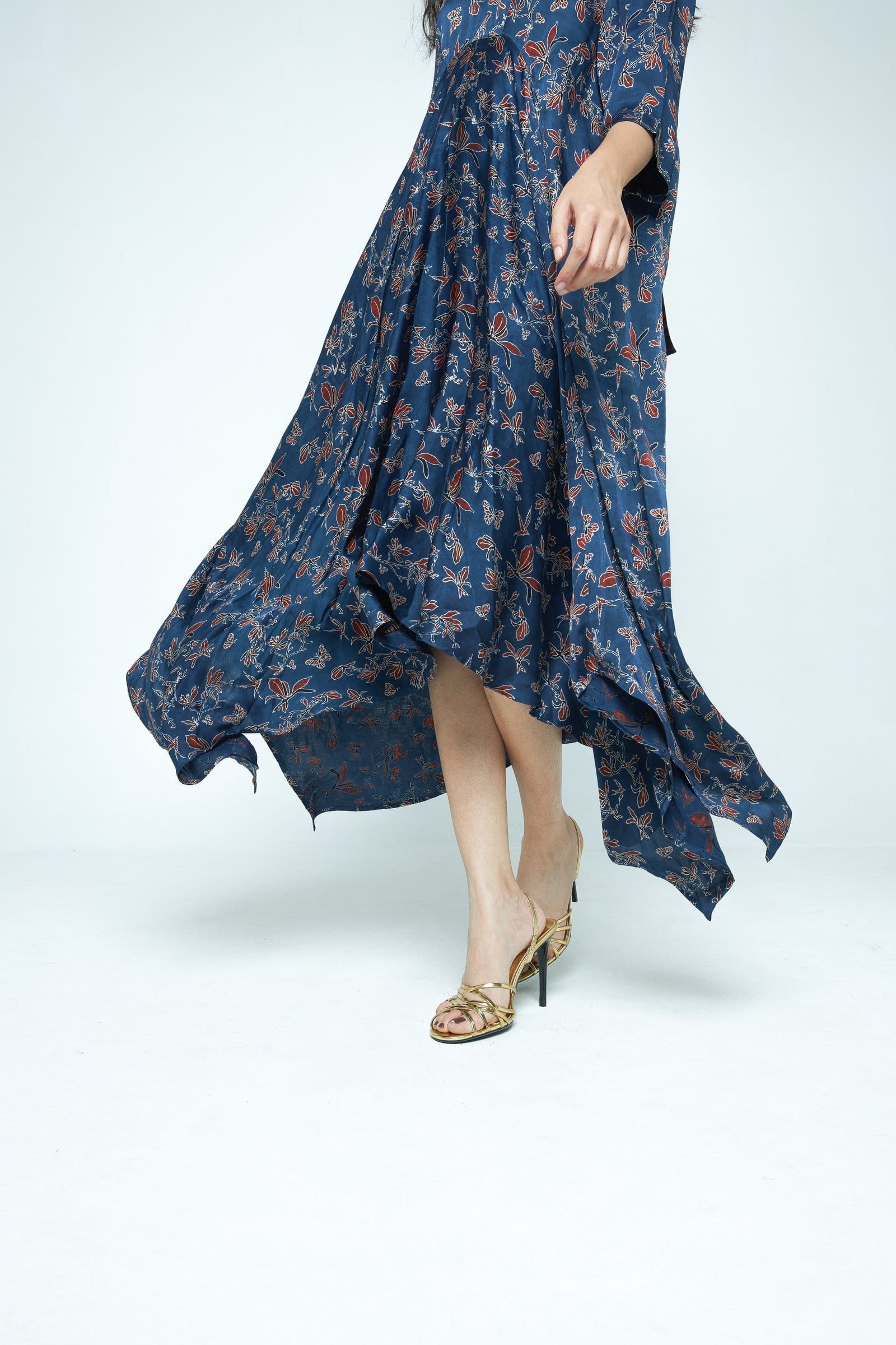 Anushe Pirani Cascade dress featuring a flowing silhouette with intricate detailing and elegant fabric.