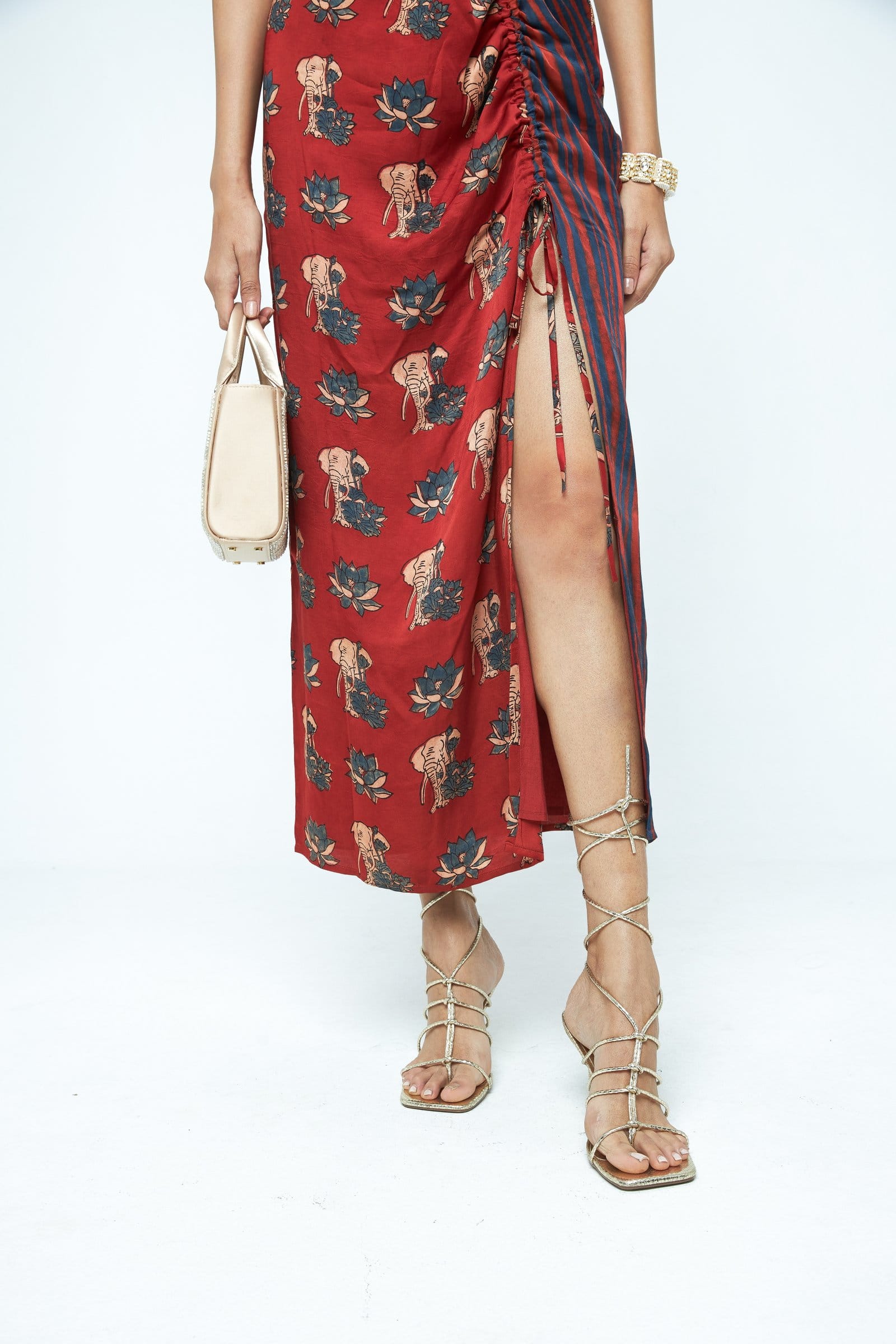 Elegant Ruché dress by Anushe Pirani featuring intricate ruching details and flowing fabric, showcased in a close-up view.