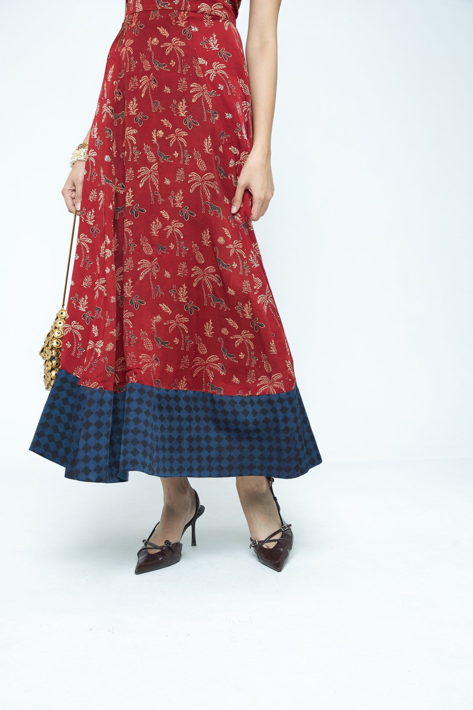 Anushe Pirani Parade flare dress with flowing fabric and intricate details, showcased in a close-up view of the dress's design.