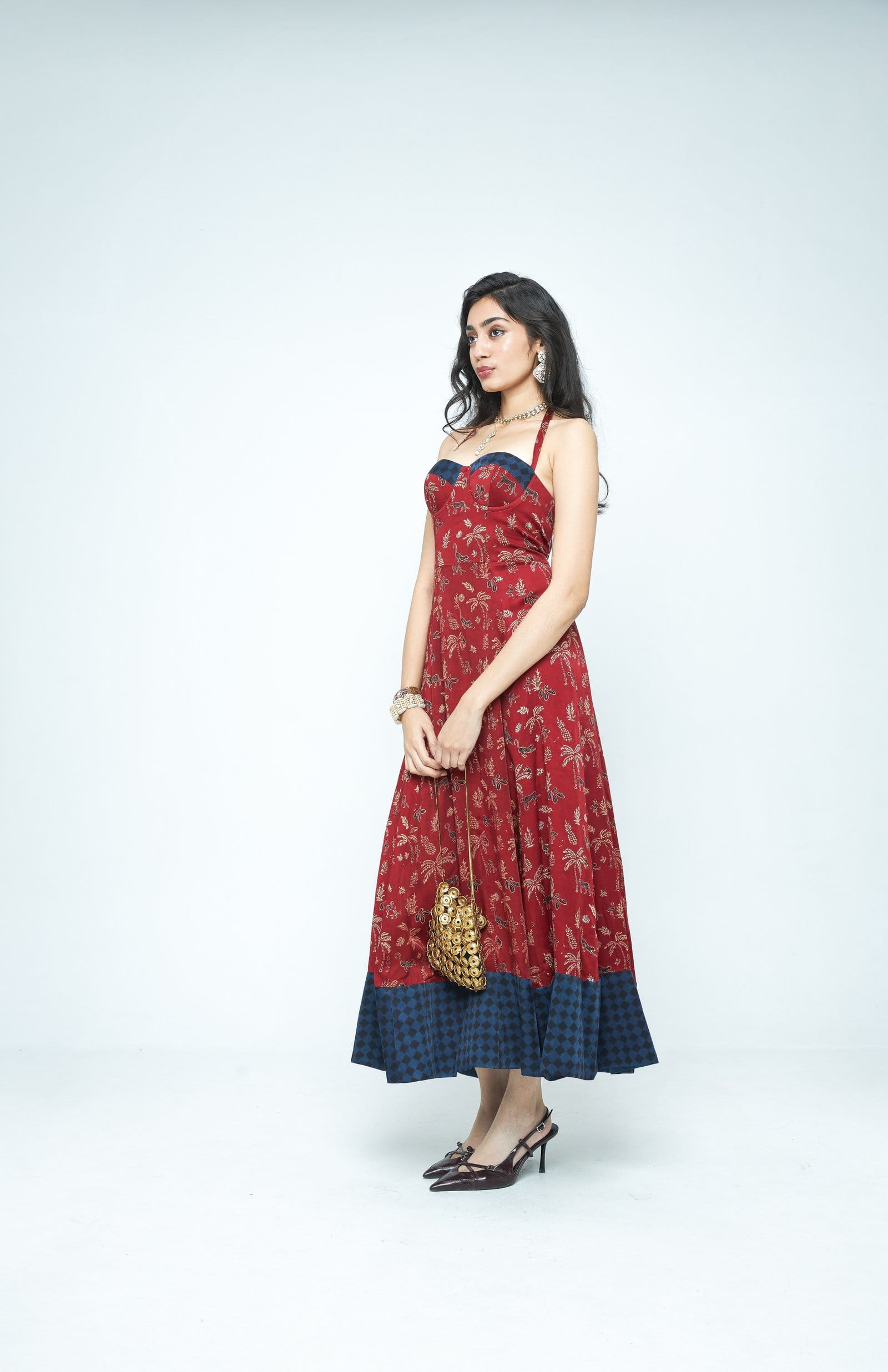 Anushe Pirani Parade flare dress shown from the side, featuring flowing fabric and a stylish silhouette.