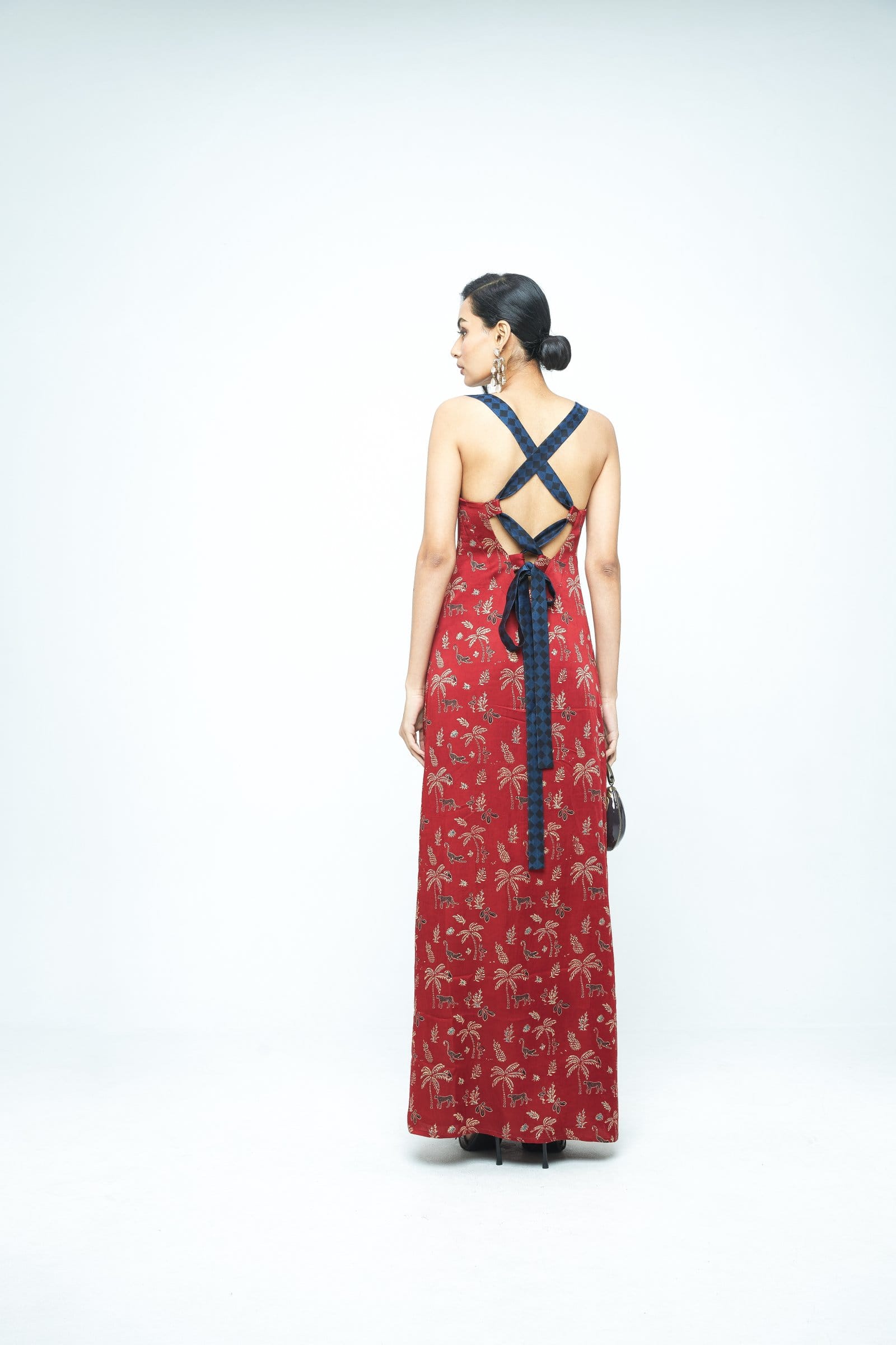 Back view of Anushe Pirani Contour dress featuring elegant tailoring and stylish design on a model.