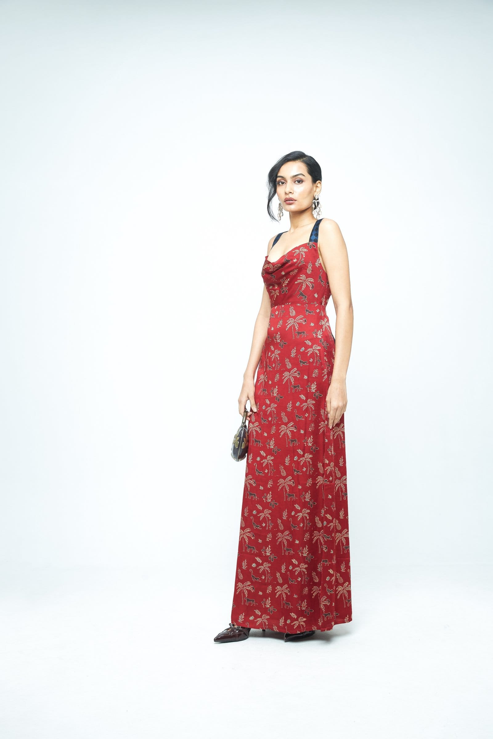 Side view of Anushe Pirani Contour dress showcasing its elegant fit and stylish design.