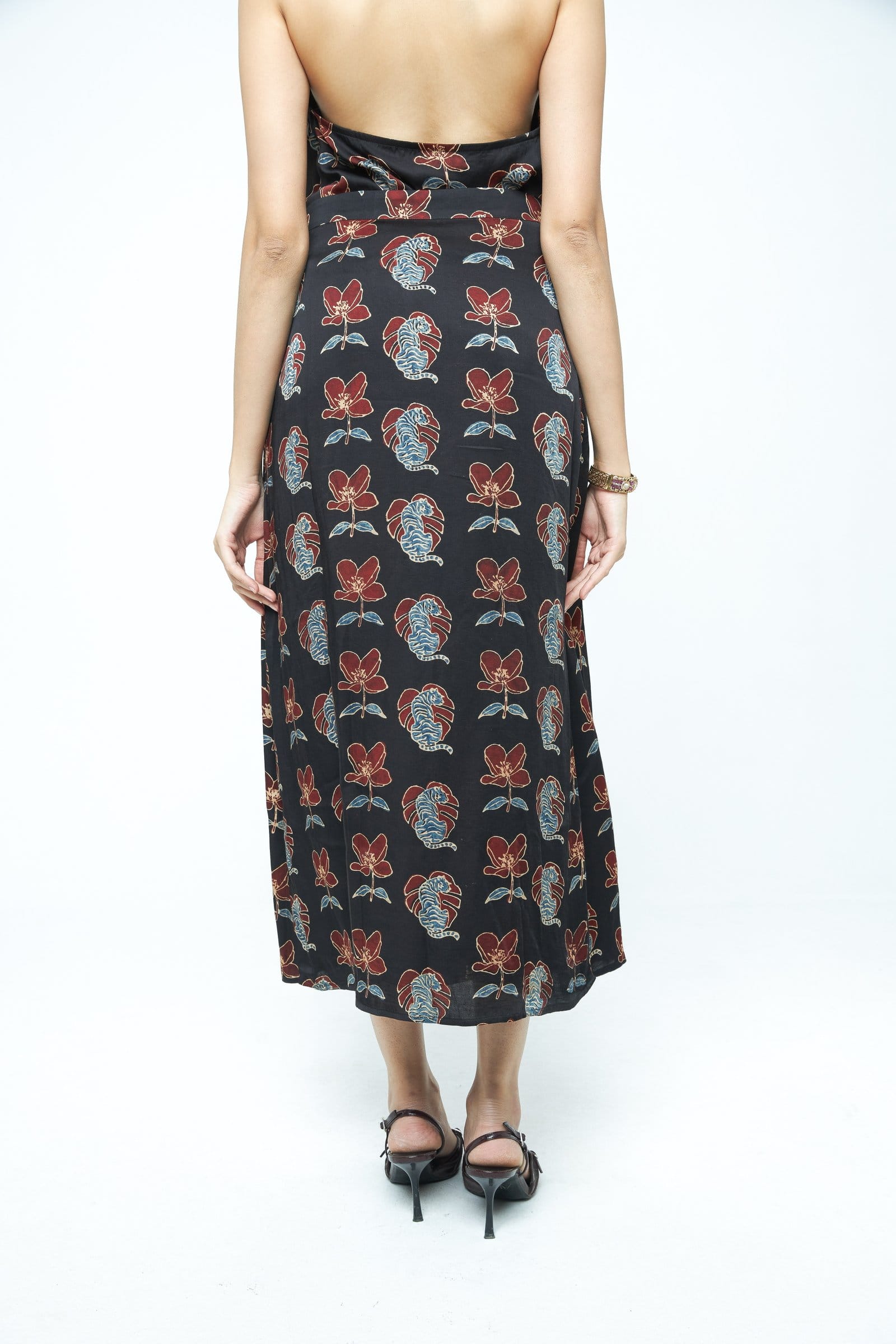 Back view of Anushe Pirani Beast slip skirt, a stylish skirt with sleek design and smooth fabric.
