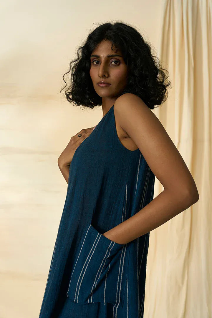 Cobalt sleeveless maxi dress by Alternative featuring a flowing design and casual style, shown on a model against a neutral background.