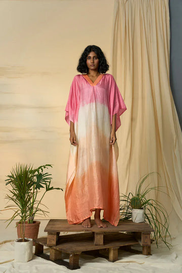 Gradient Radiate maxi dress by Alternative featuring a flowing kaftan style with vibrant color transitions and relaxed fit.