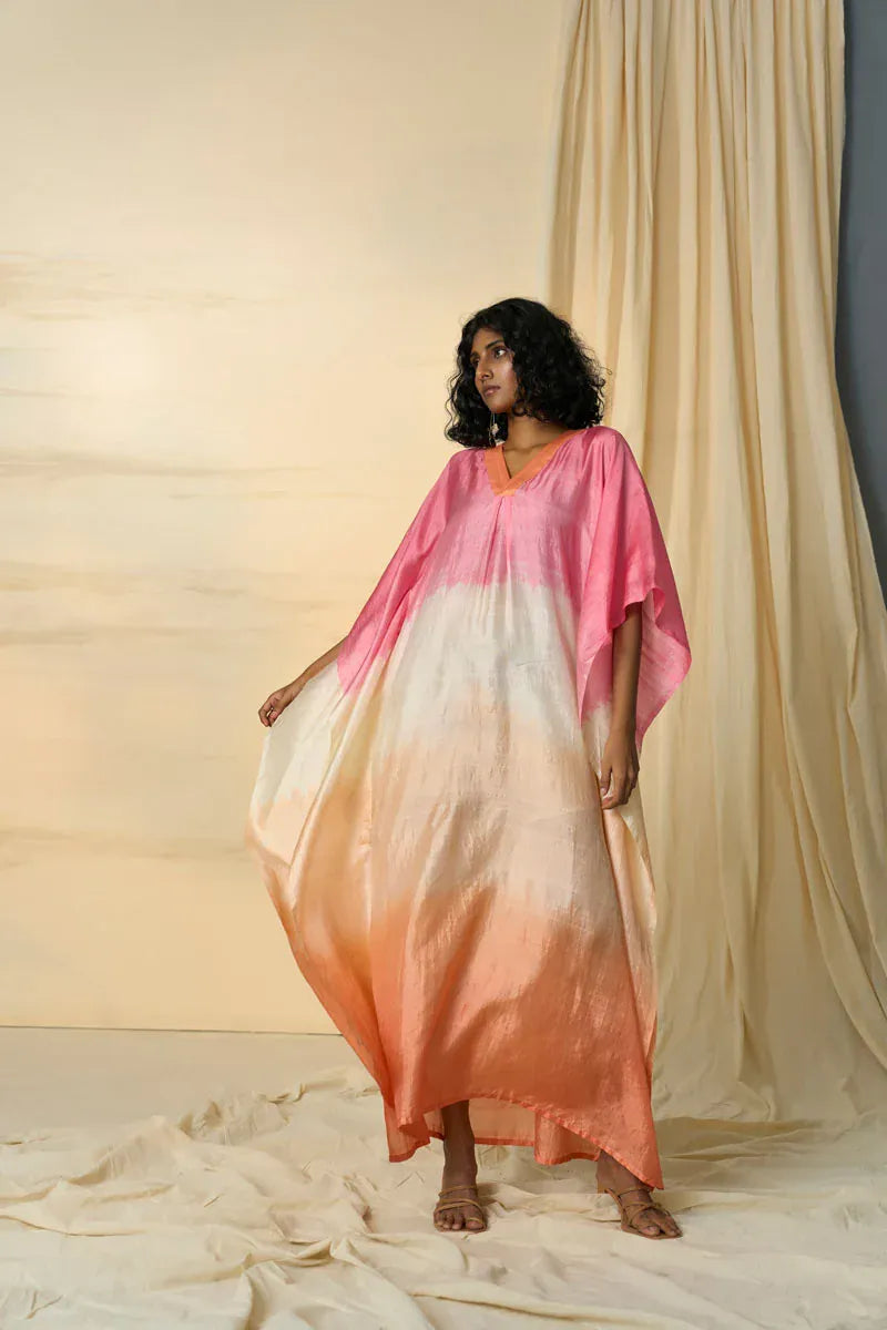 Gradient Radiate maxi dress by Alternative featuring a flowing kaftan style with vibrant color transitions and relaxed fit.