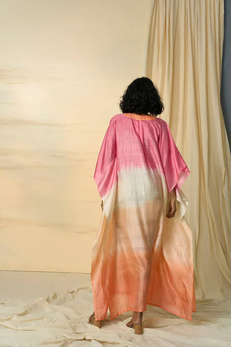 Gradient Radiate maxi dress by Alternative featuring a flowing kaftan style with vibrant color blending.