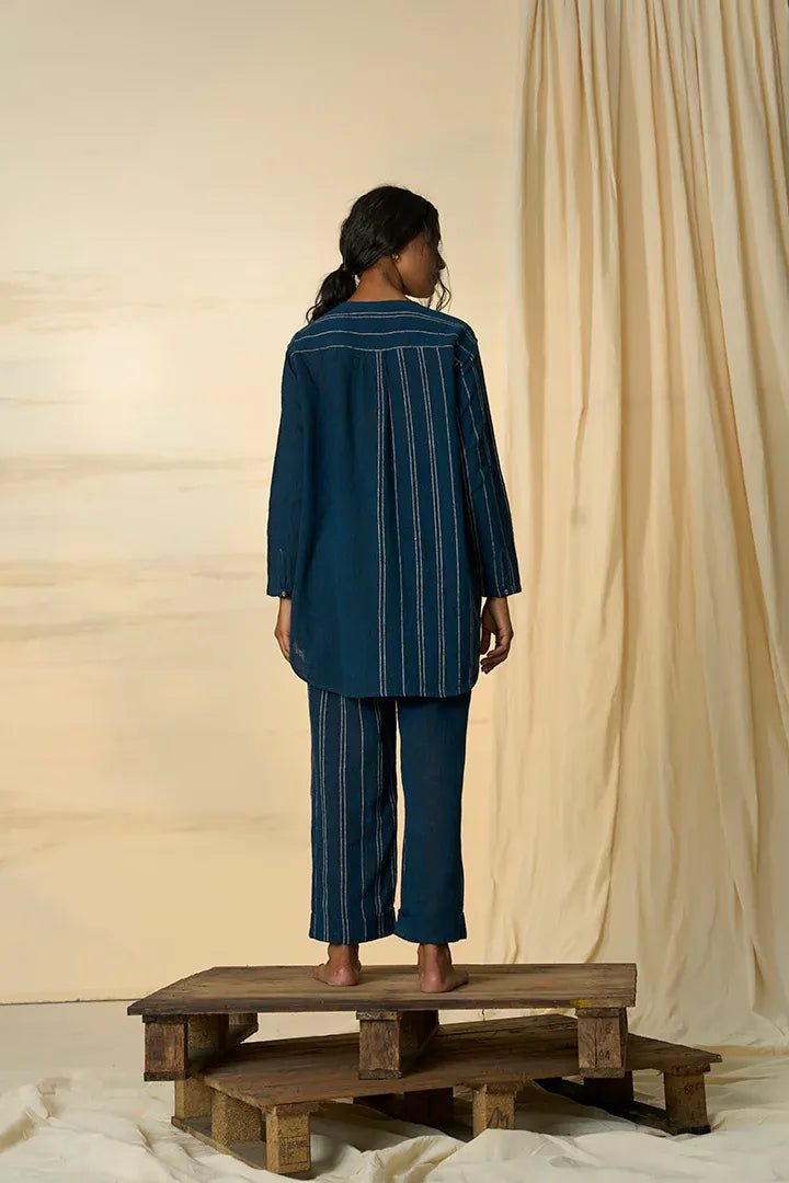 Alternative cobalt trousers with a slim fit design, showcasing the vibrant blue color and tailored style on a model.