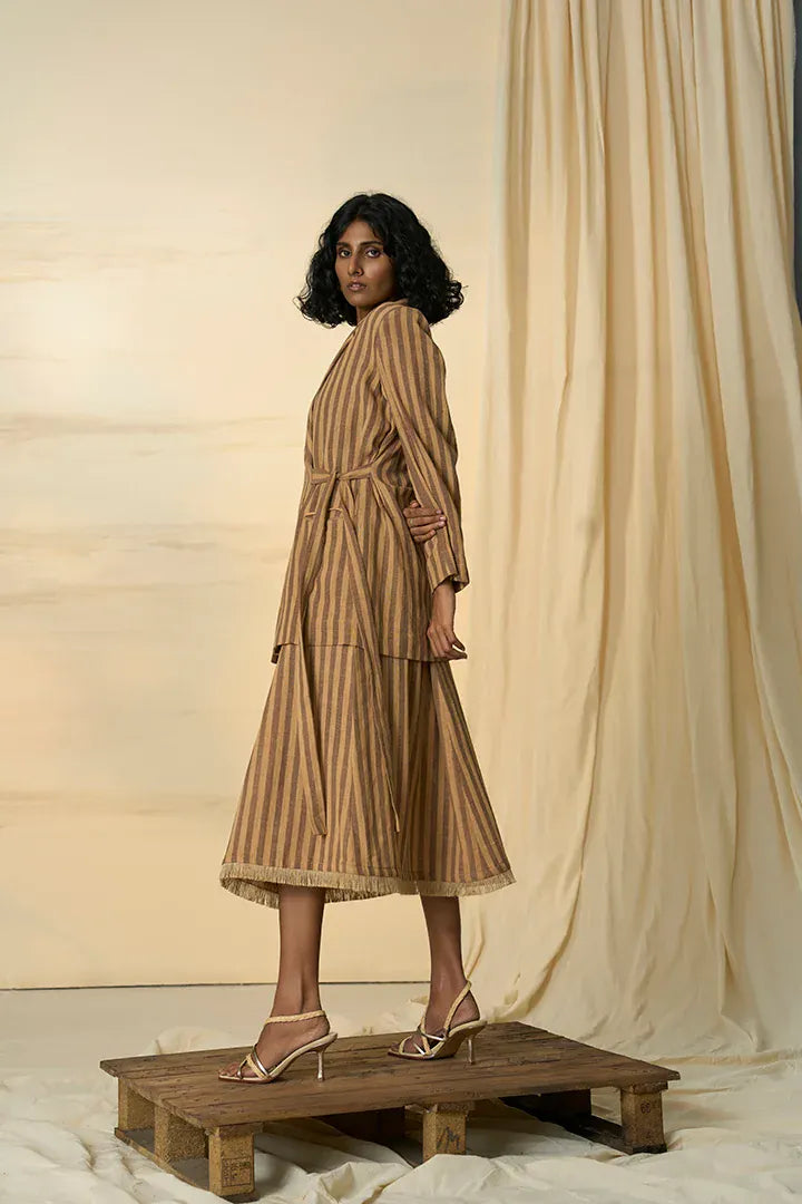 Desert-colored Alternative blazer with tie-up front, tailored fit, and long sleeves, styled for a modern, chic look.