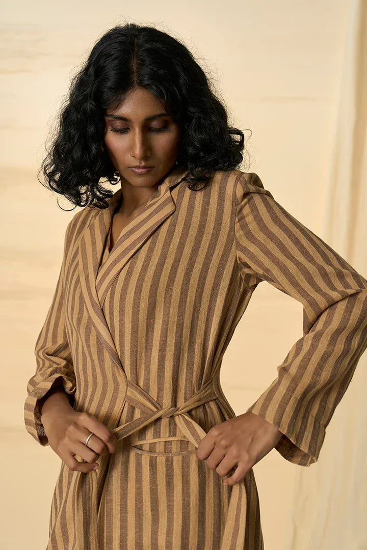 Desert tie-up blazer by Alternative featuring a stylish, fitted design with tie details at the waist and classic blazer silhouette.