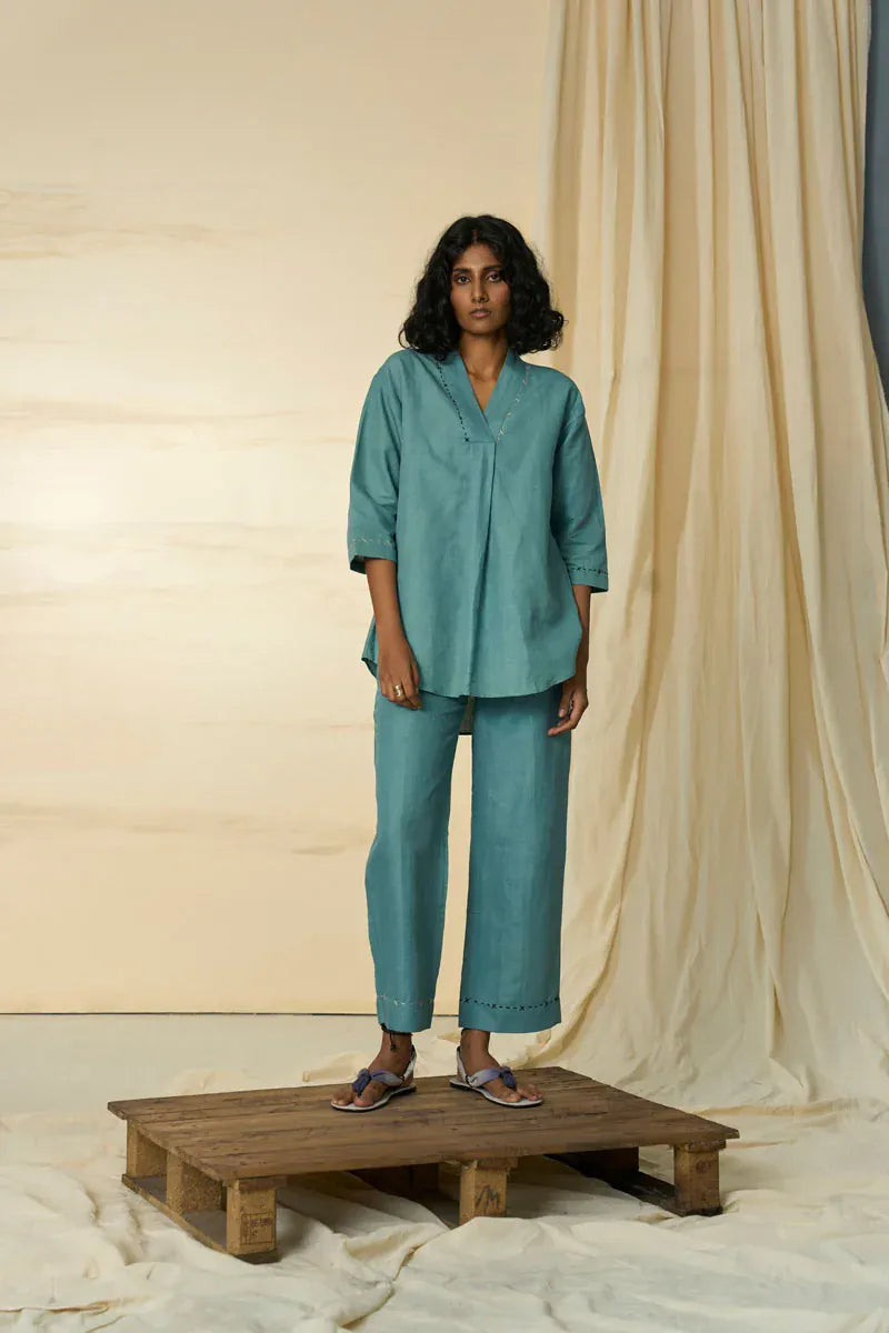 Desert V-neck set by Alternative, a stylish coordinated outfit featuring a V-neck top and matching bottoms, in neutral desert tones.