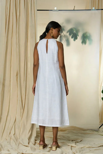 Alternative Manila maxi dress in vibrant floral print, flowing fabric, and sleeveless design perfect for summer wear.