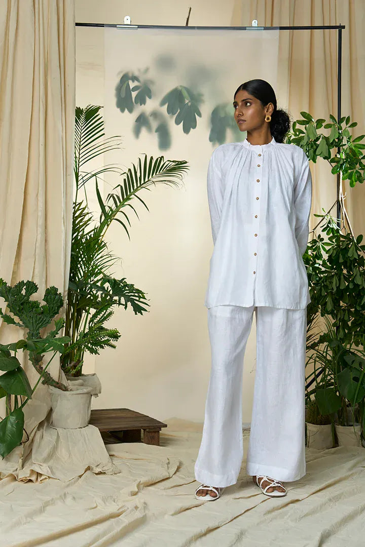 Alternative Manila gathered shirt, a stylish tops with gathered fabric detail, shown in a natural pose on a model.