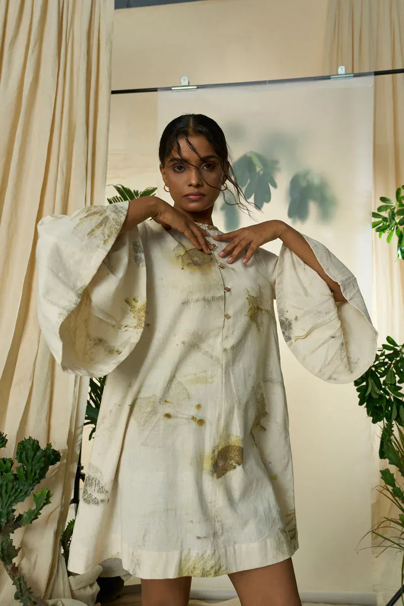 Green live leafy smocked maxi dress from Alternative featuring a relaxed, flowing design and leafy print.
