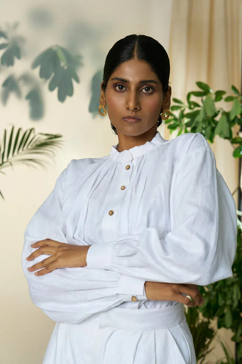 Alternative Manila gathered shirt, a stylish women's top featuring a relaxed fit and gathered details, shown in a neutral color.