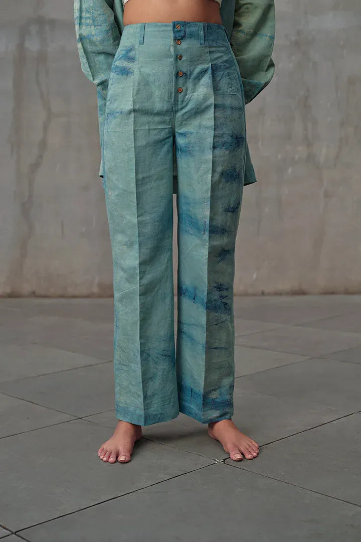 Azure shirt and trousers set by Alternative, featuring a stylish coordinated outfit with a button-up shirt and matching trousers.