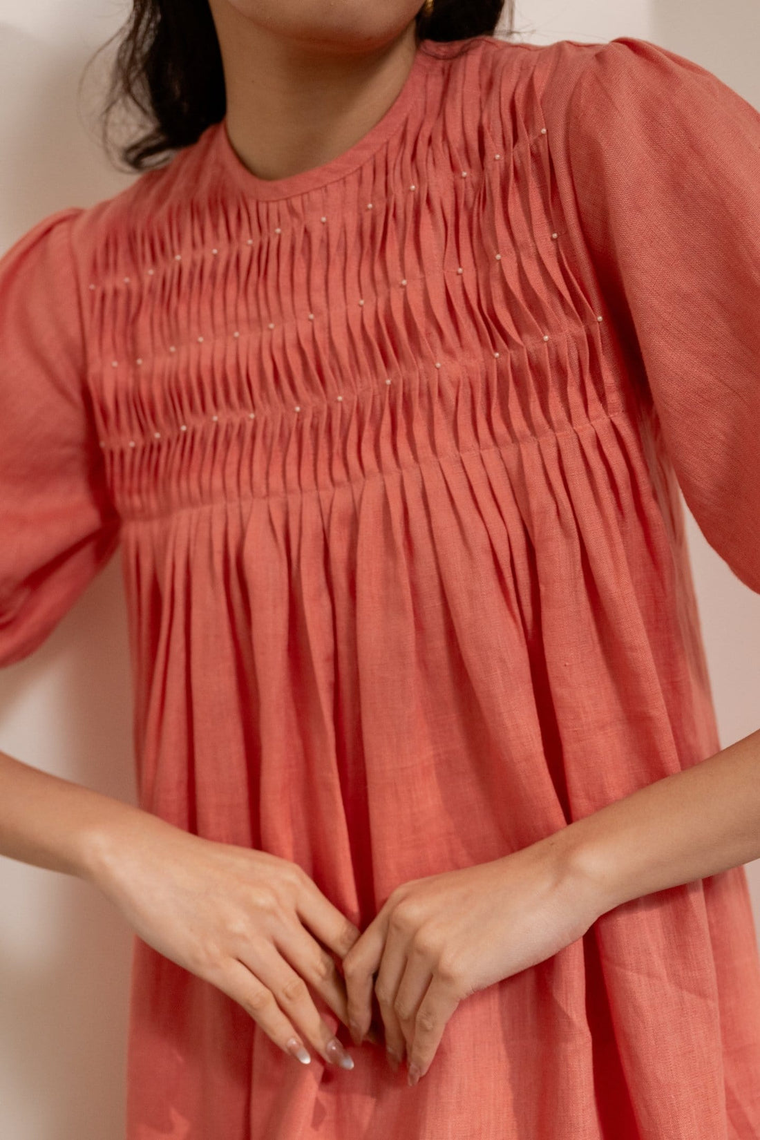 Dawn-orange smocked maxi dress by Alternative featuring a relaxed fit and lightweight fabric, perfect for casual summer wear.