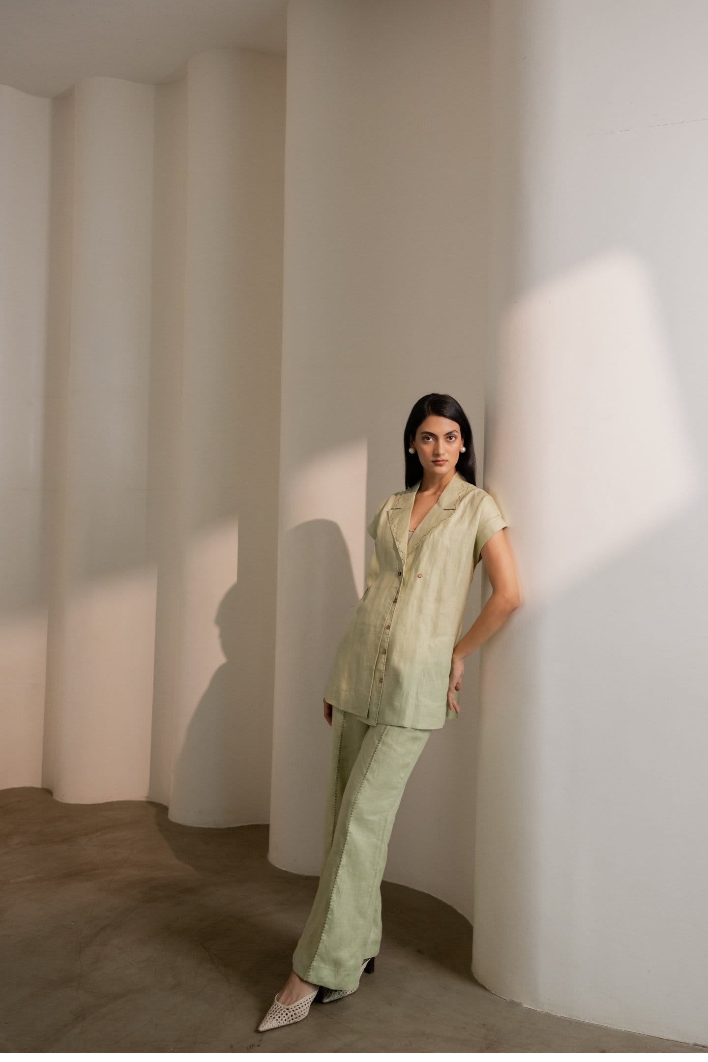 Dew mint green Alternative blazer featuring a tailored fit, shown paired with matching pants in a stylish, professional look.