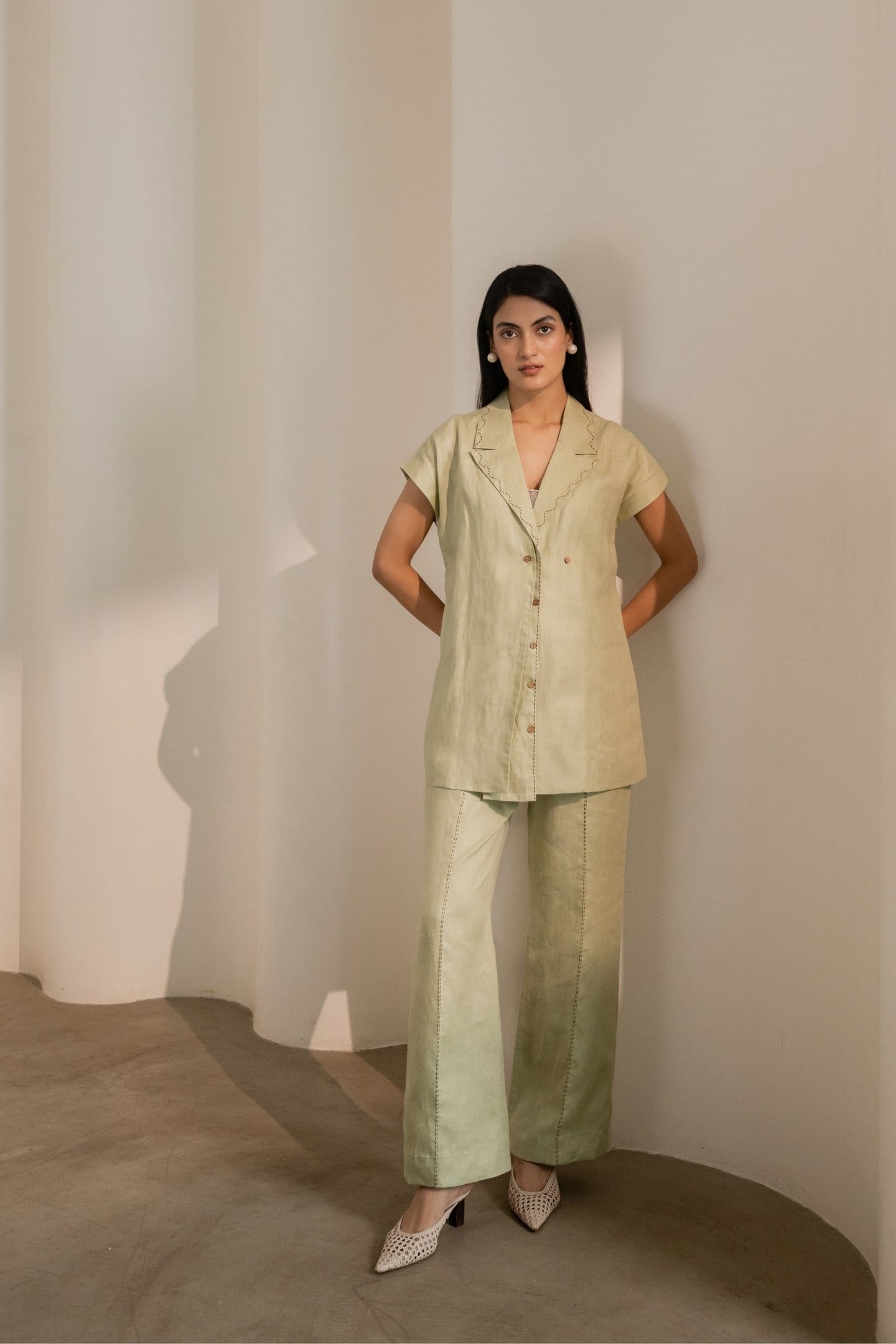 Mint green Dew trousers from Alternative, casual pants with a relaxed fit, shown on a model.
