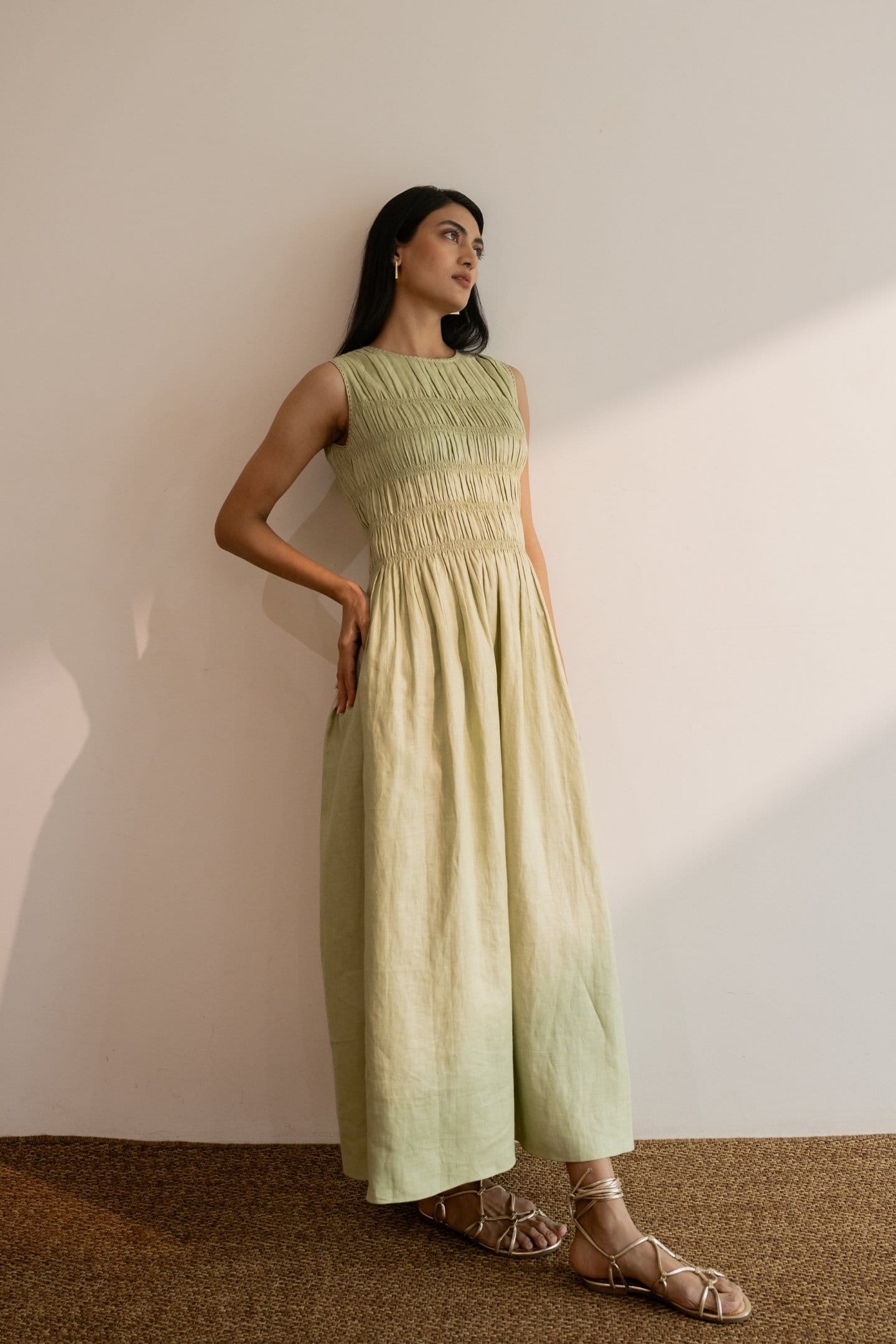Dew mint green smocked maxi dress by Alternative featuring a relaxed fit and flowing fabric, perfect for casual summer wear.